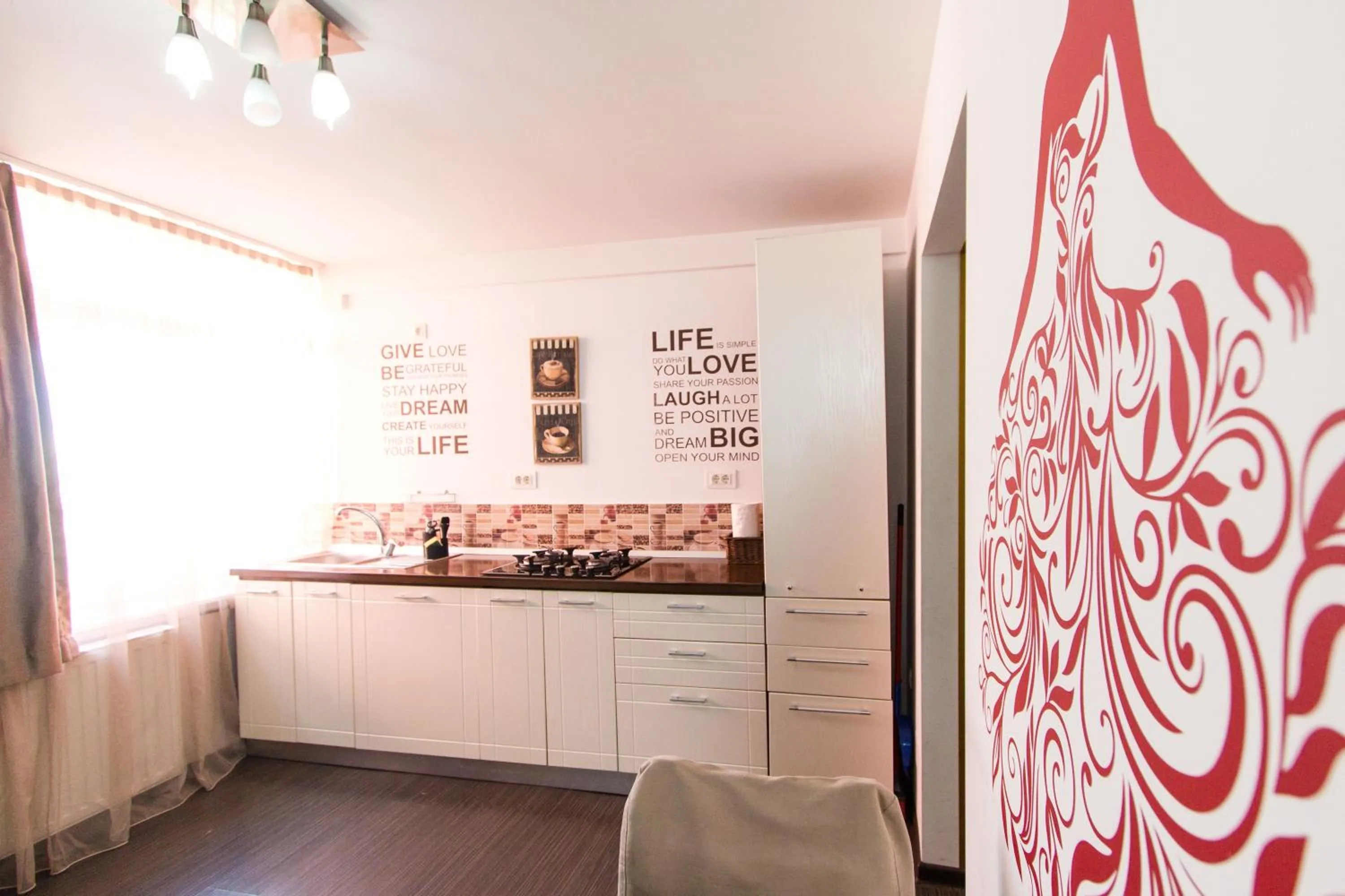 Kitchen or kitchenette in Hotel Jolie Apartments