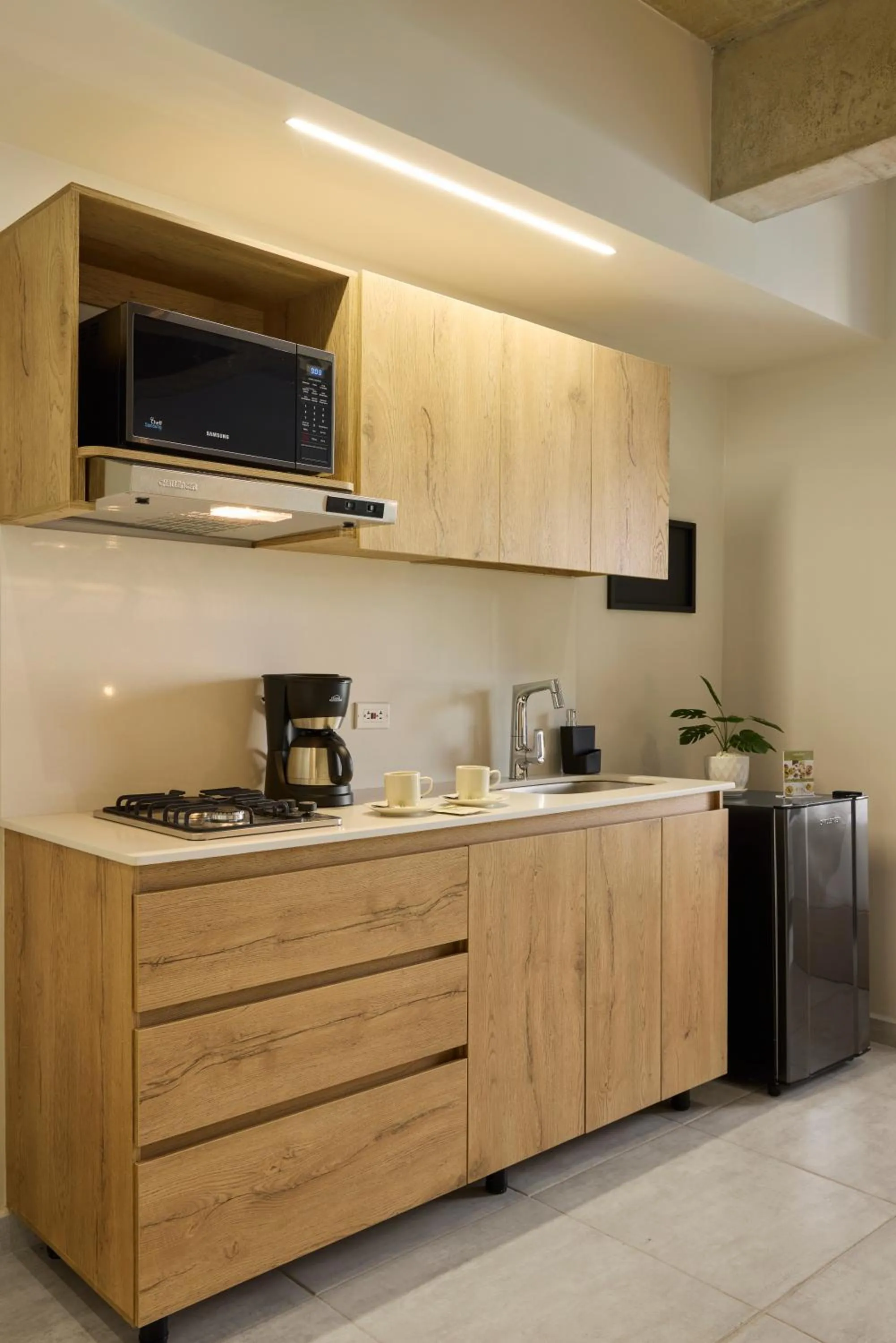 kitchen in 30 Living Suites