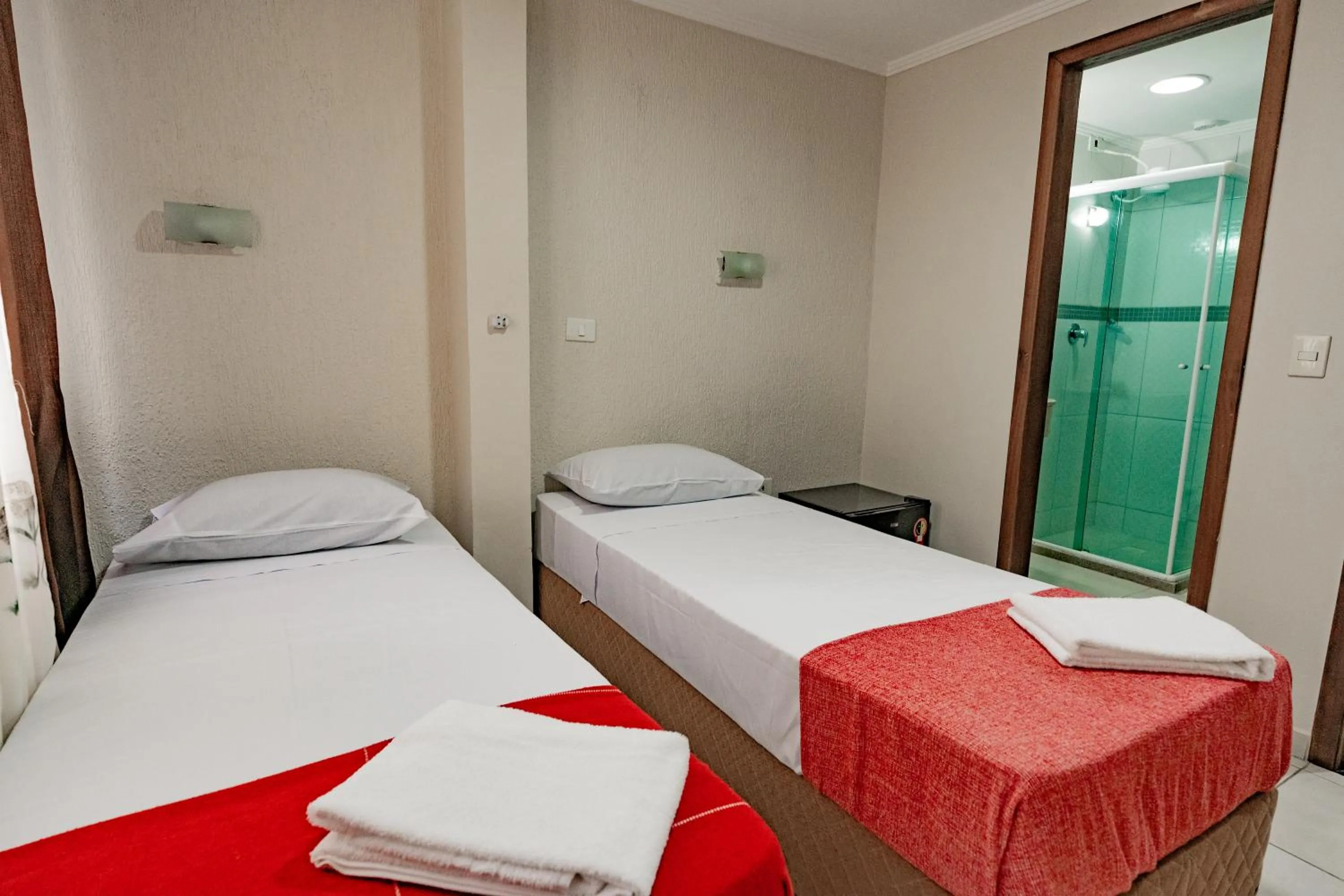 Photo of the whole room, Bed in HANNA Balneário Hotel