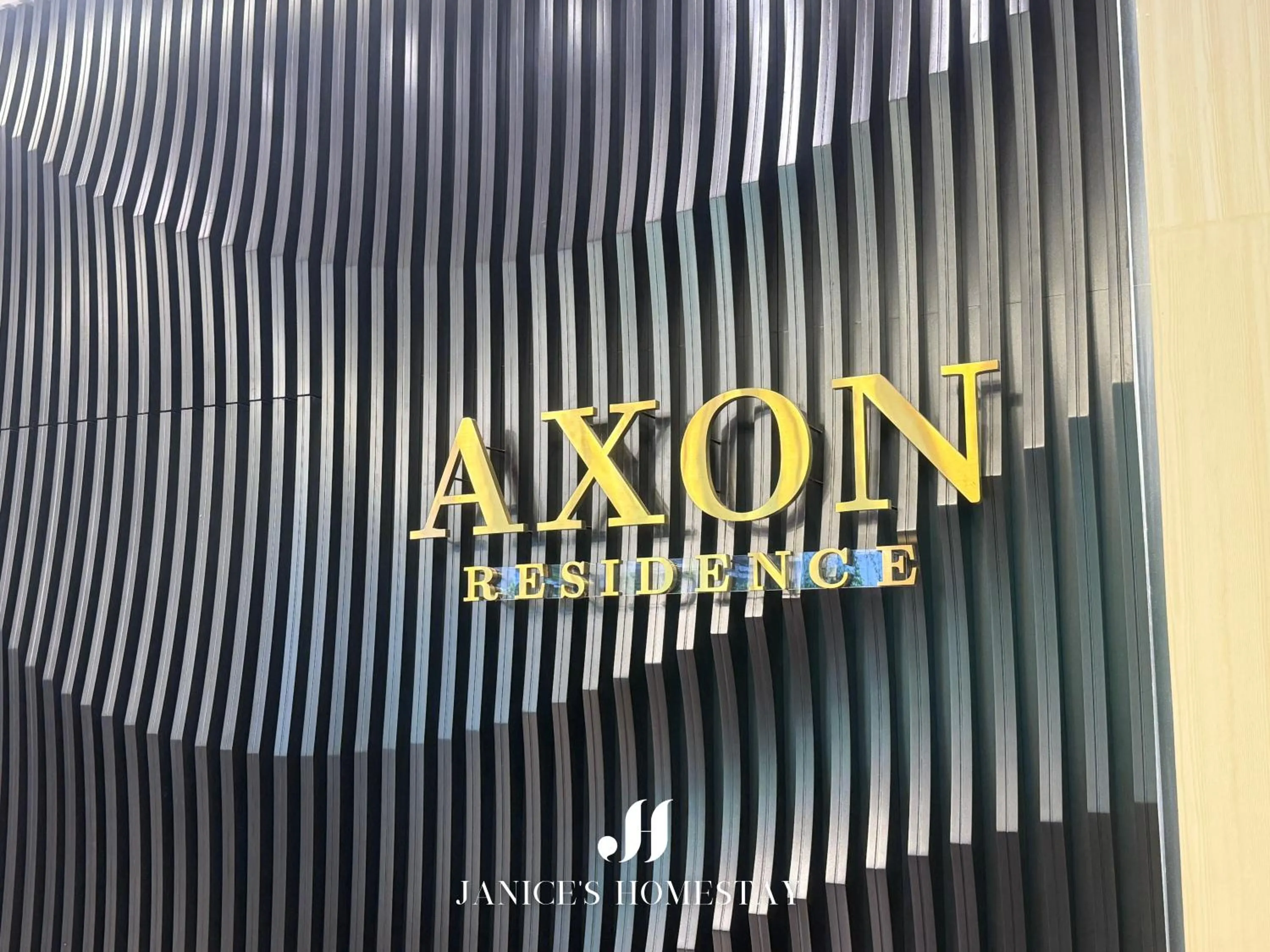 Property logo or sign in Axon Residences Bukit Bintang by Janice's Homestay