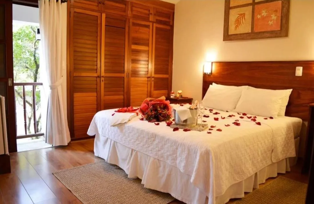 Bed in Pousada O Garimpo.