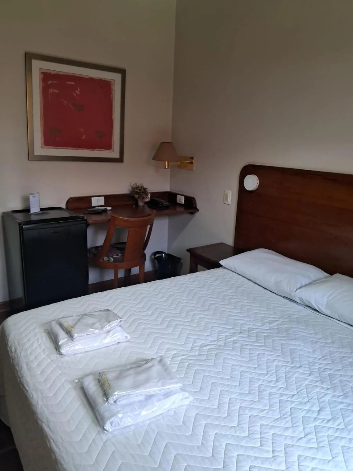 Bed in Pousada O Garimpo.