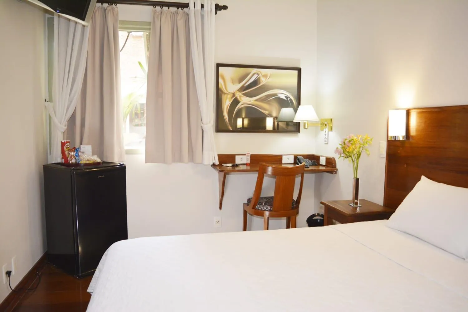 Bed in Pousada O Garimpo.