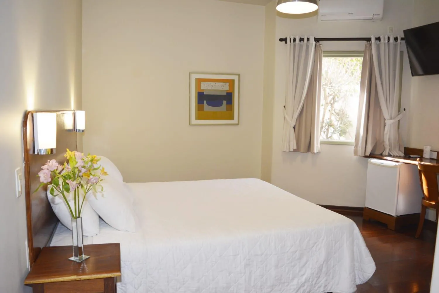 Bed in Pousada O Garimpo.