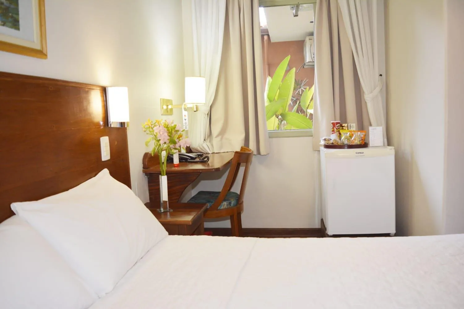 Bed in Pousada O Garimpo.