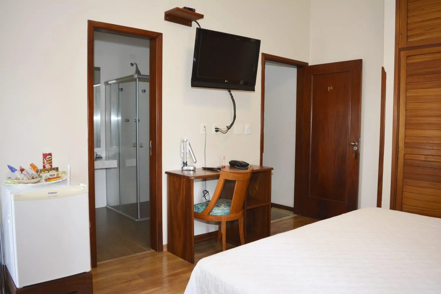 Bed in Pousada O Garimpo.