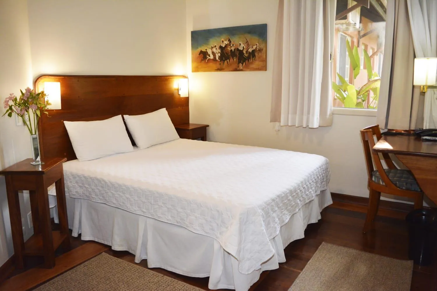 Bed in Pousada O Garimpo.