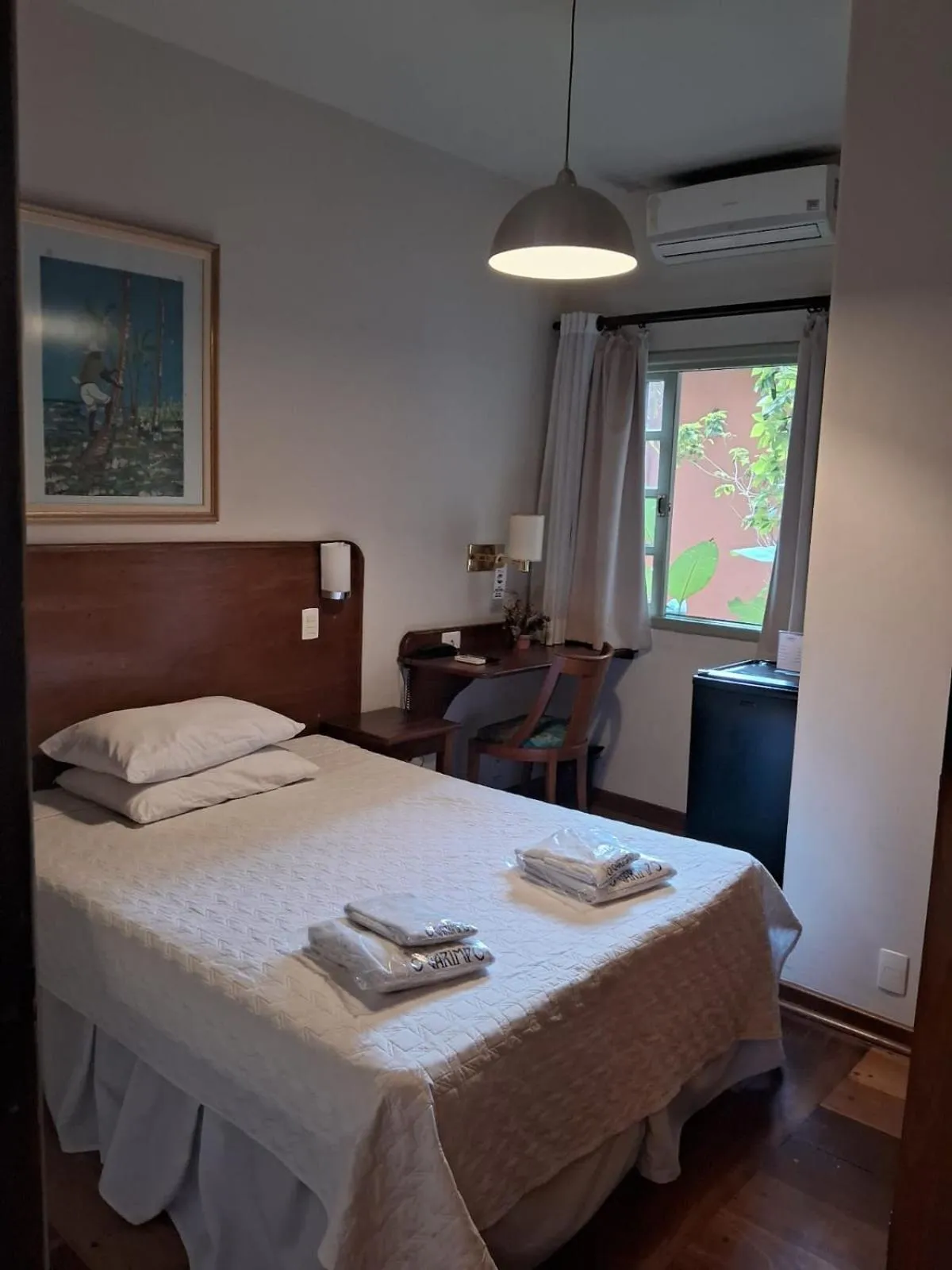 Bed in Pousada O Garimpo.