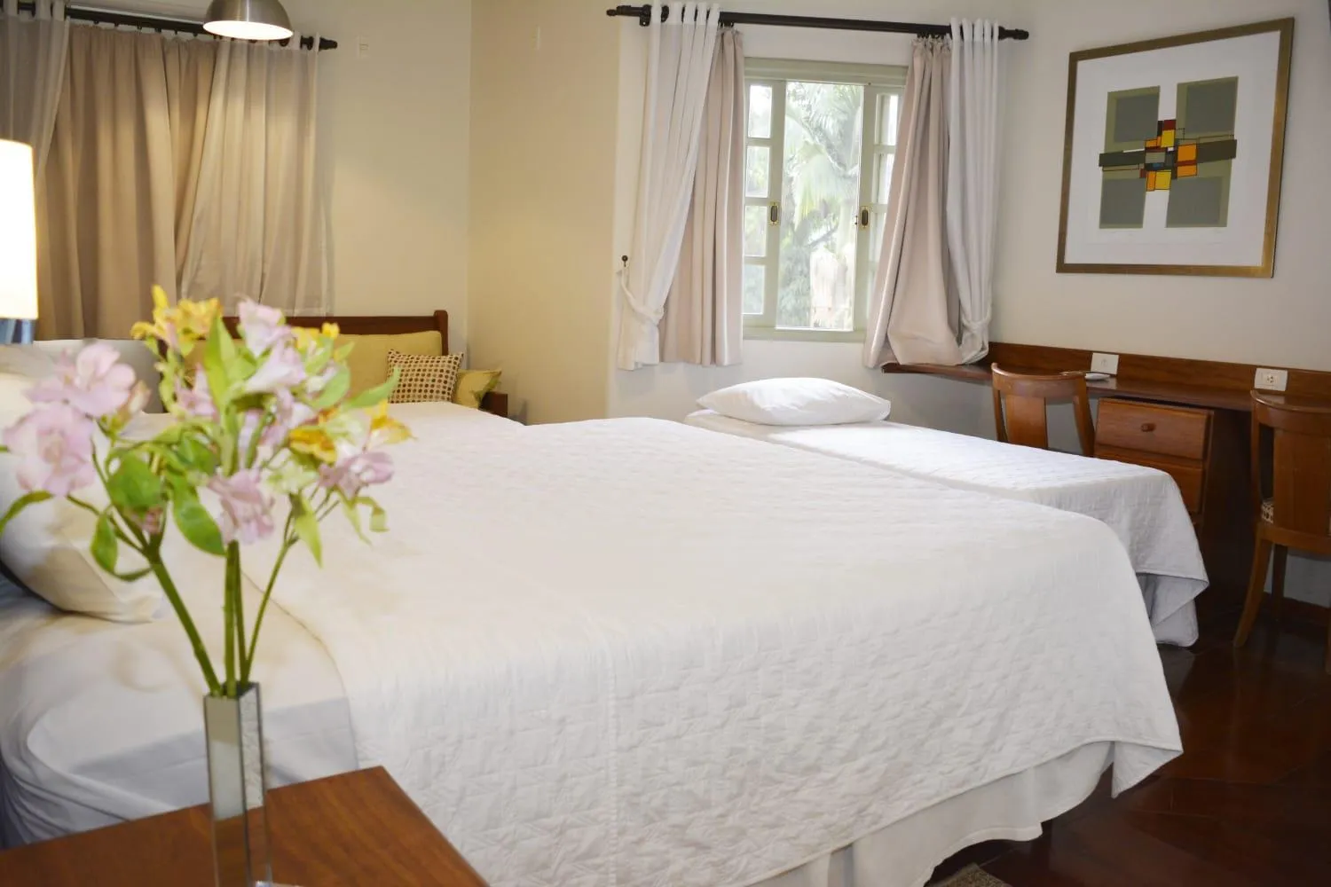 Bed in Pousada O Garimpo.