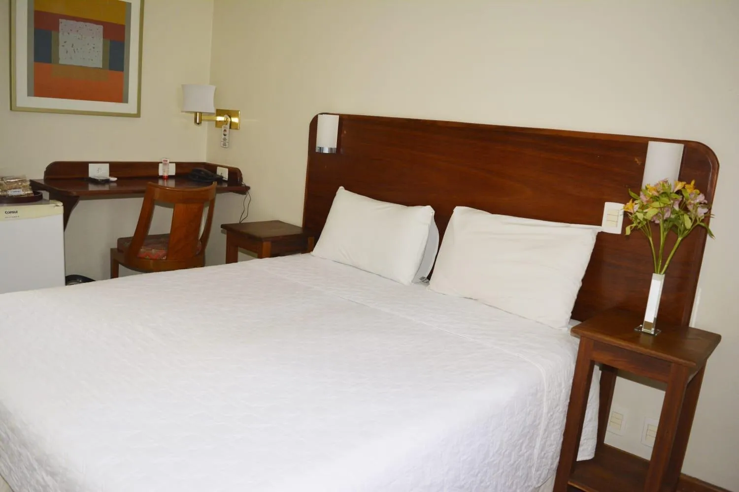 Bed in Pousada O Garimpo.