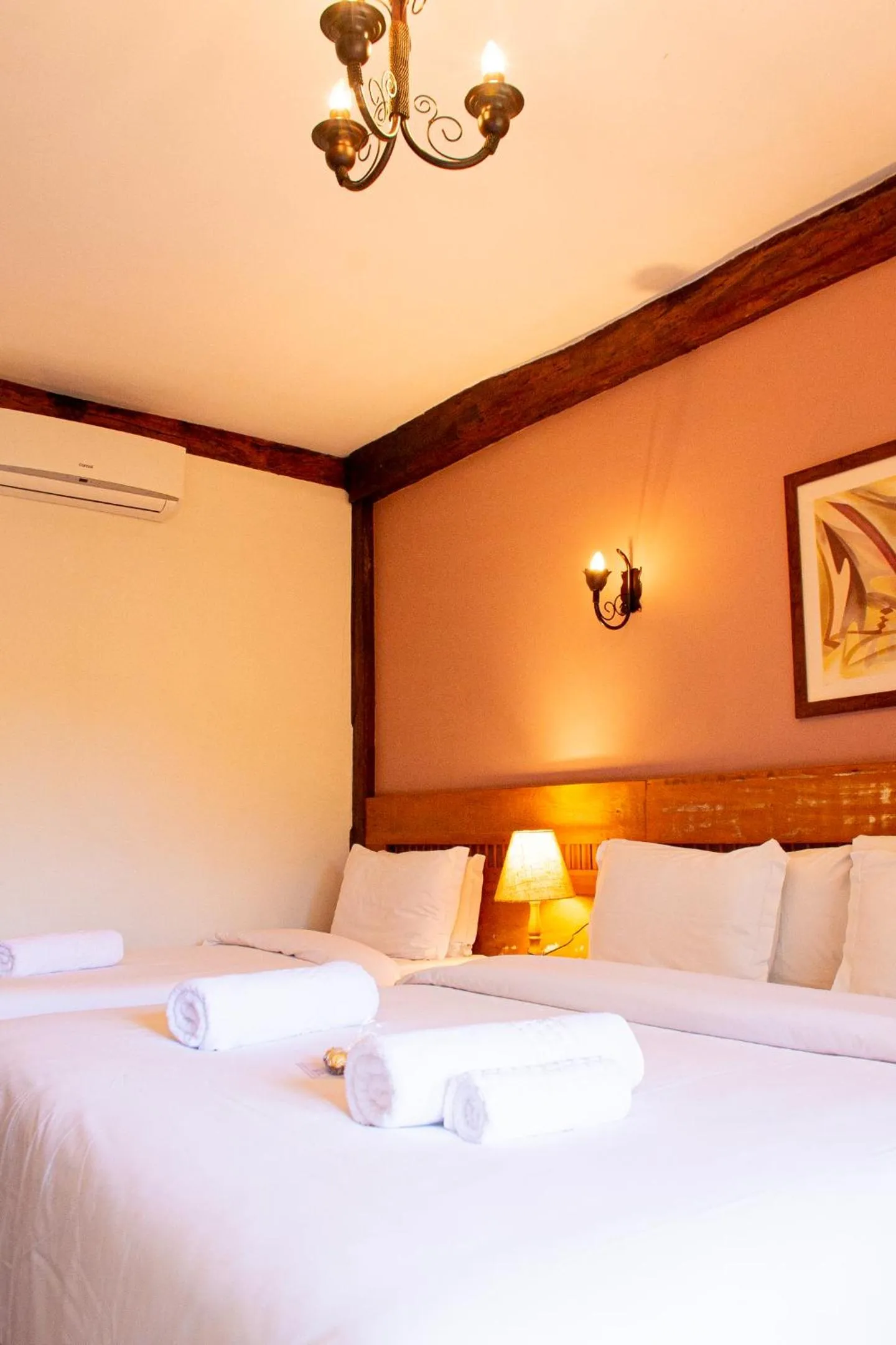 Bed in Pousada Chão de Minas