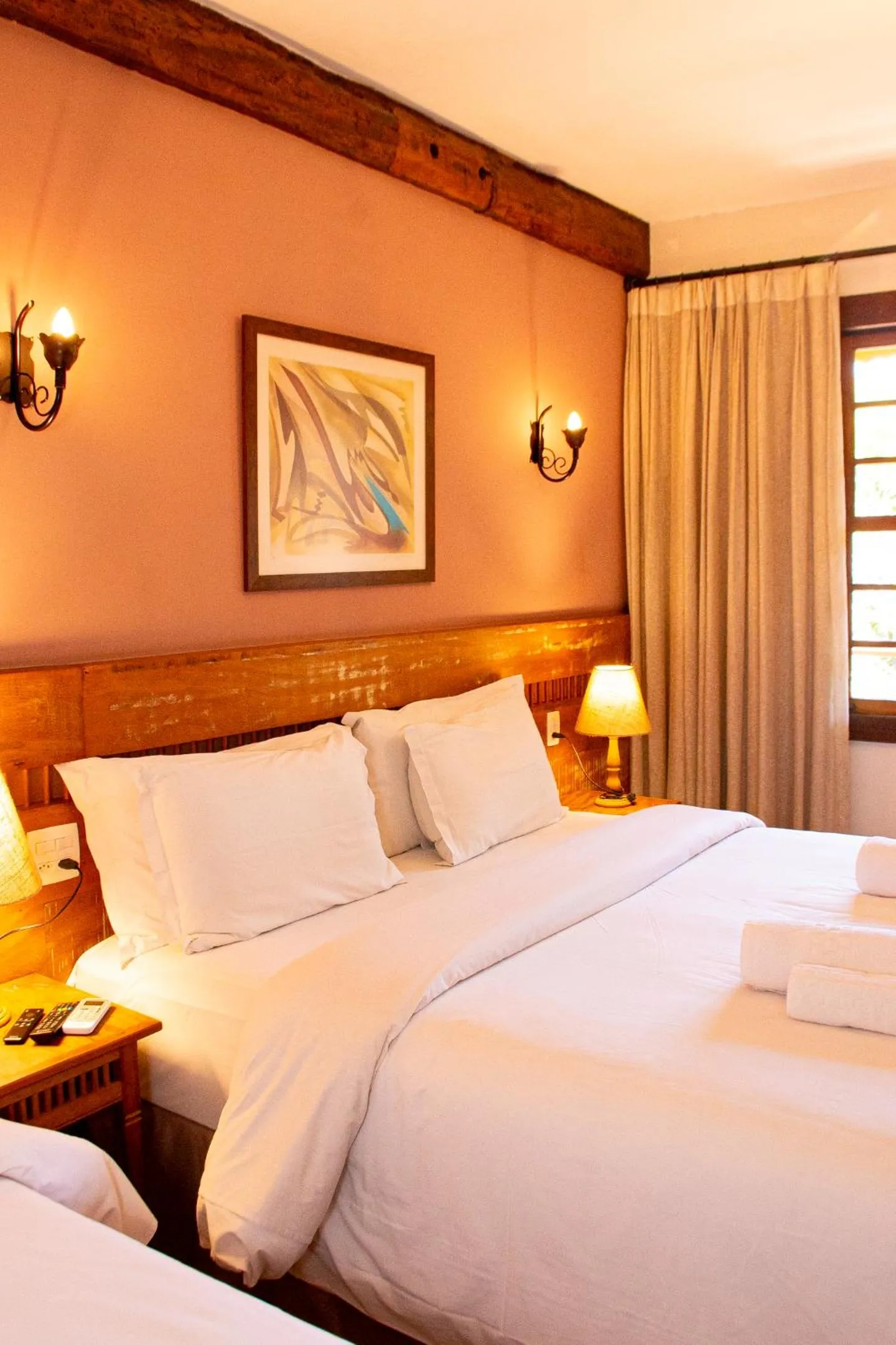 Bed in Pousada Chão de Minas