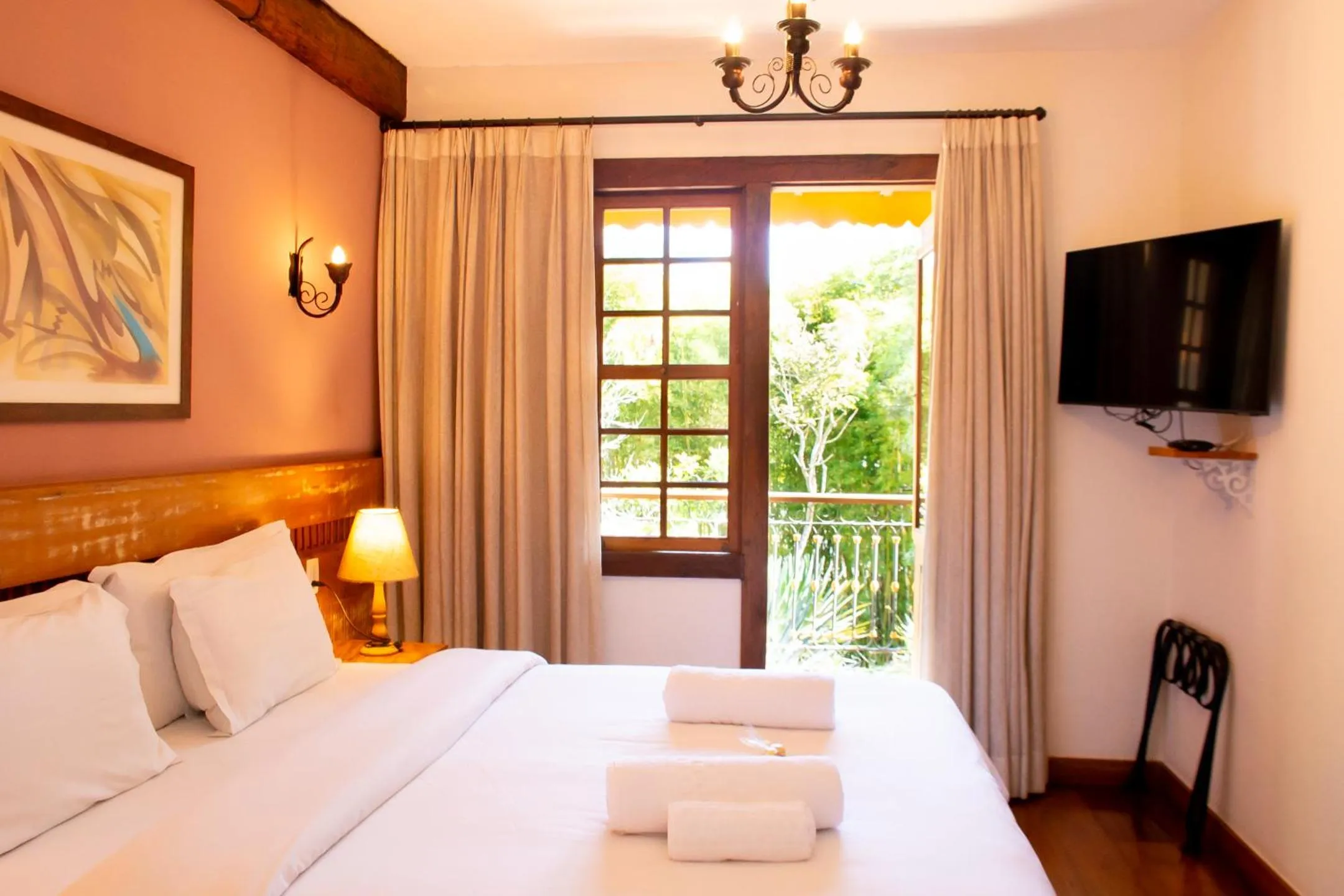 TV and multimedia, Bed in Pousada Chão de Minas