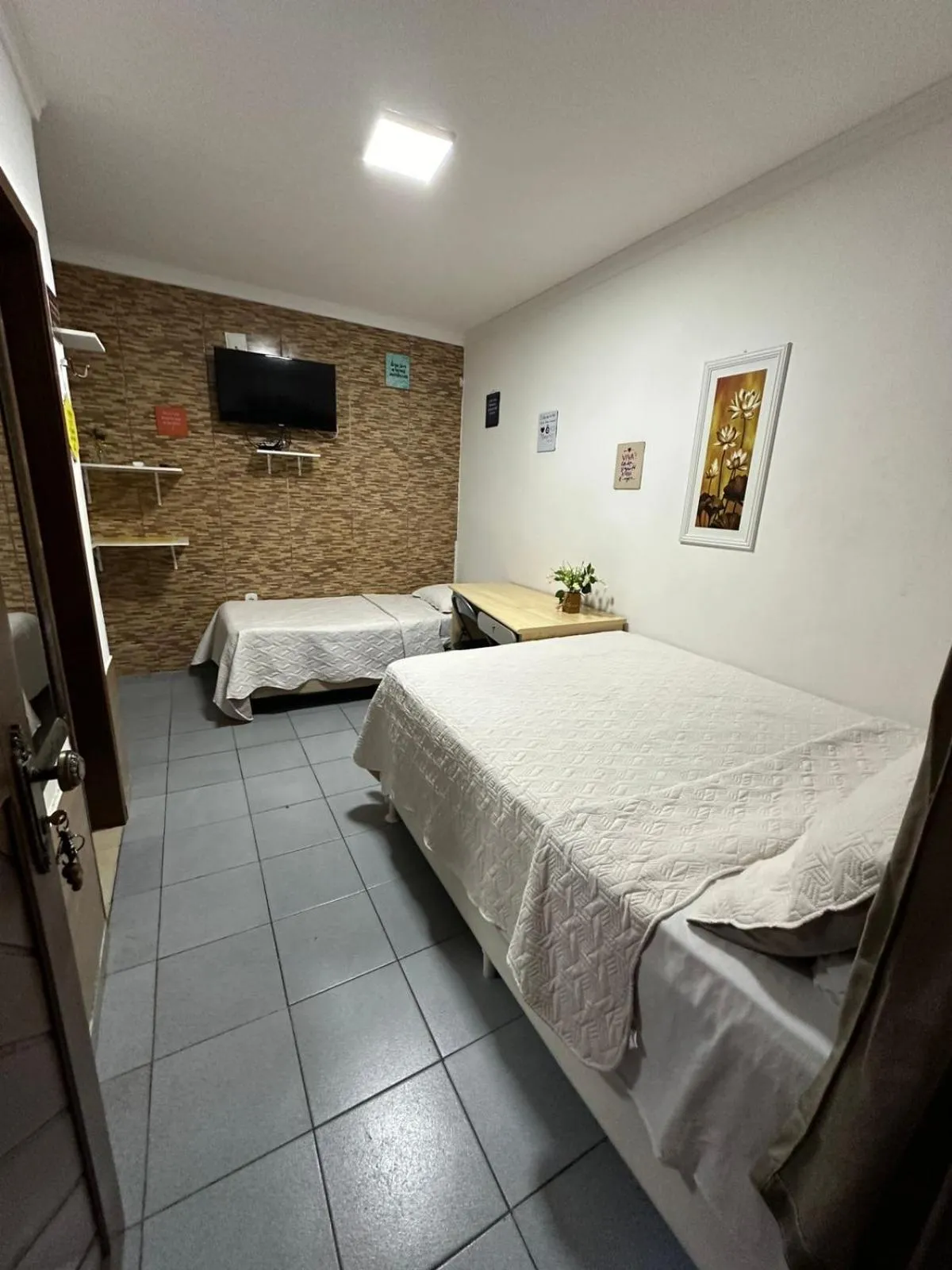 Bed in Pousada Flor Dália