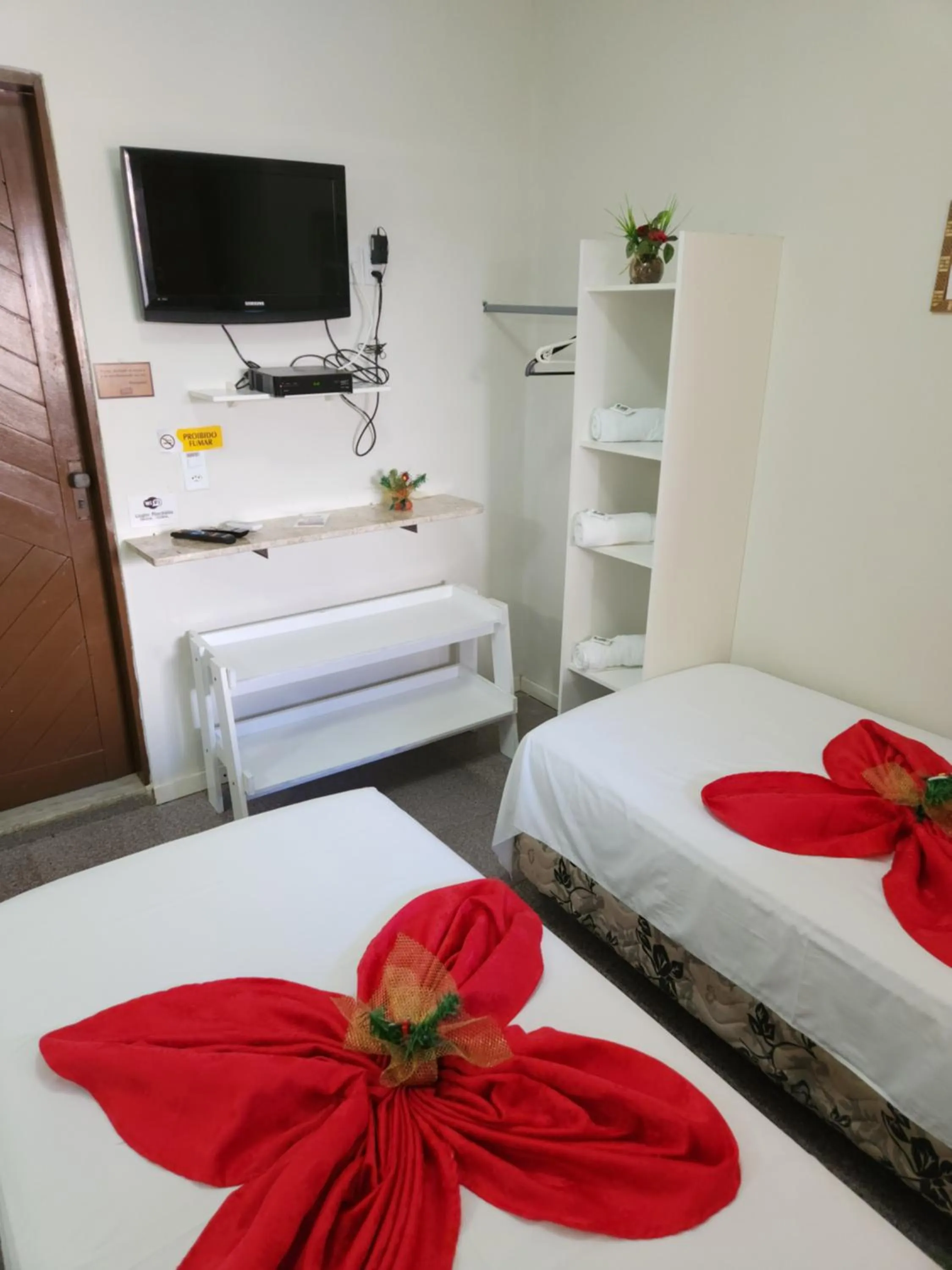 Photo of the whole room, Bed in Pousada Flor Dália