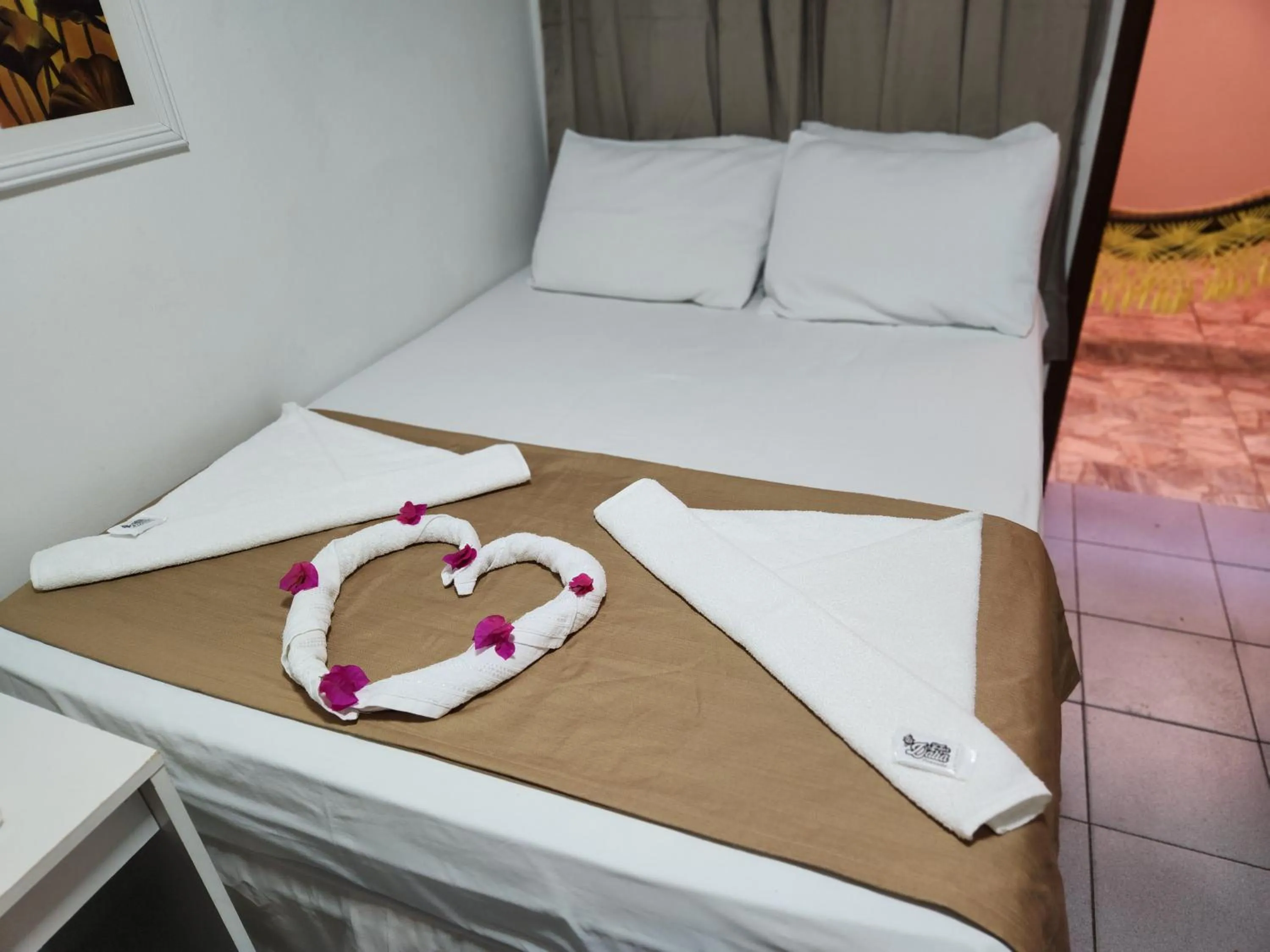 Bed in Pousada Flor Dália