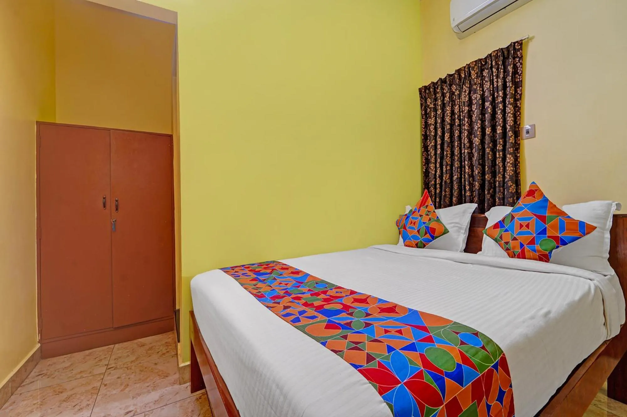 Bed in FabHotel Martine's Residency - French Colony, 5 Mins from Rock Beach