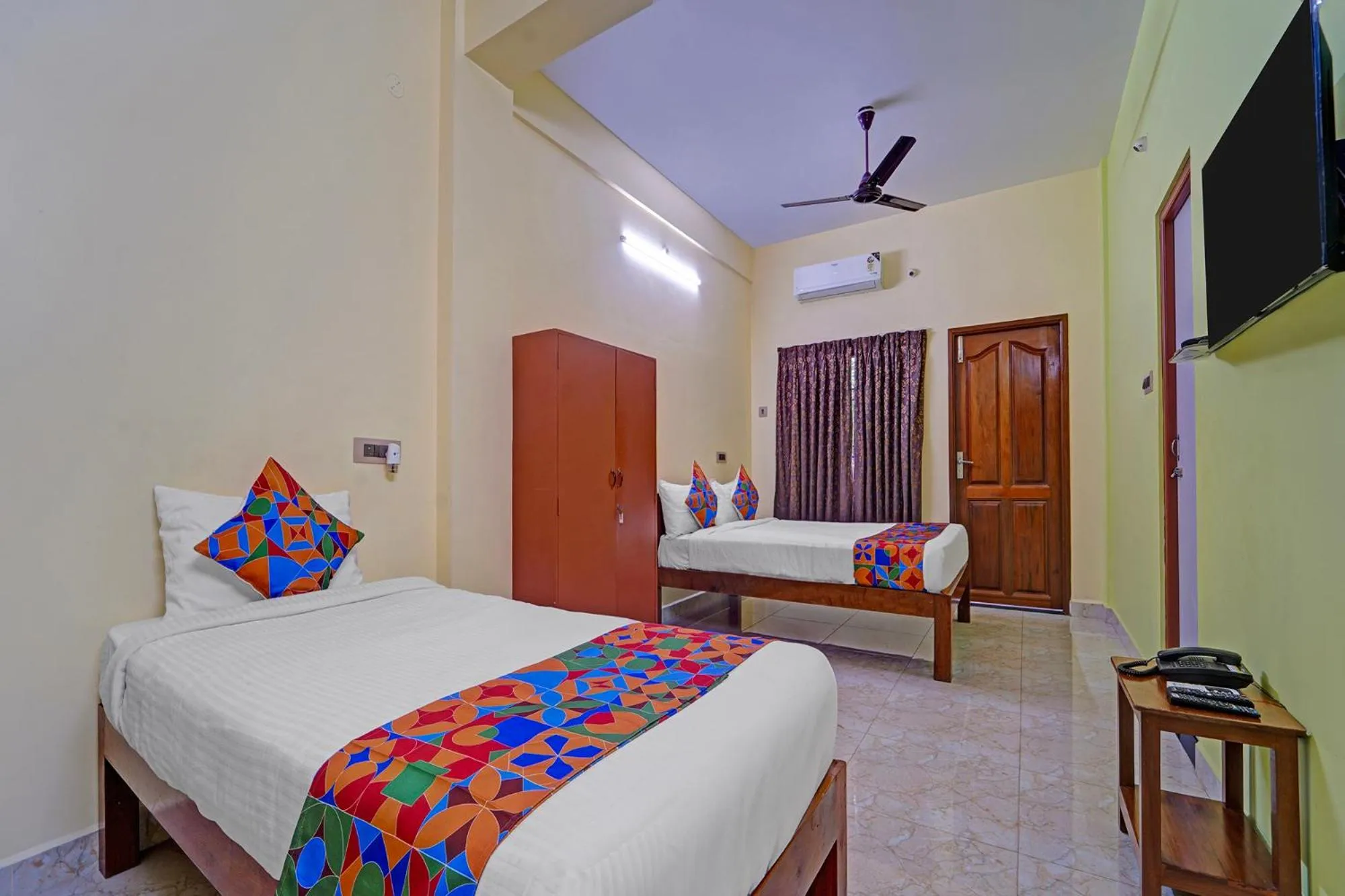 Bed in FabHotel Martine's Residency - French Colony, 5 Mins from Rock Beach