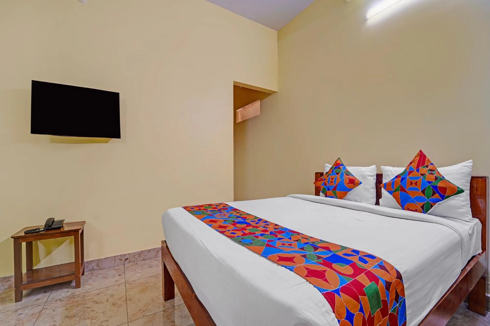 Bed in FabHotel Martine's Residency - French Colony, 5 Mins from Rock Beach