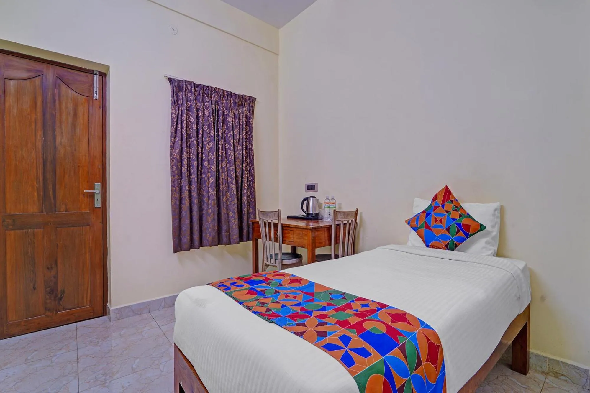 Bed in FabHotel Martine's Residency - French Colony, 5 Mins from Rock Beach