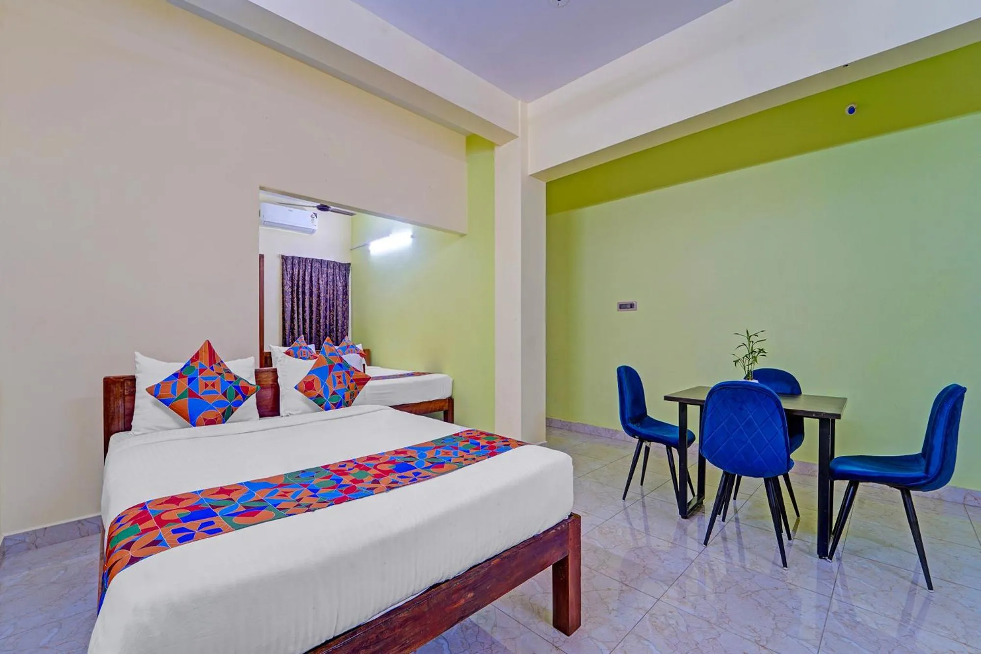 Bed in FabHotel Martine's Residency - French Colony, 5 Mins from Rock Beach