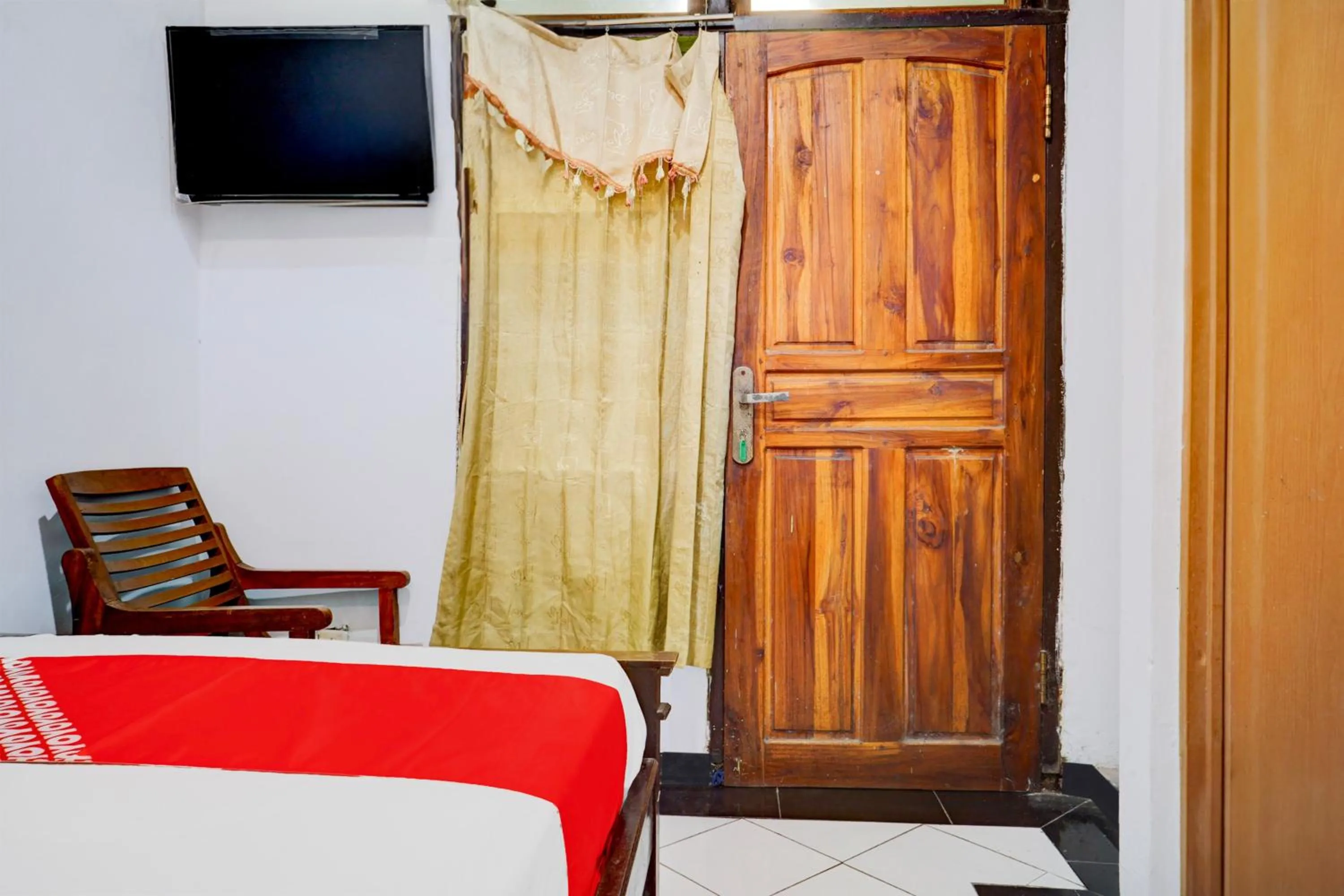 Bedroom in OYO 93069 Penginapan Sumber Rizki