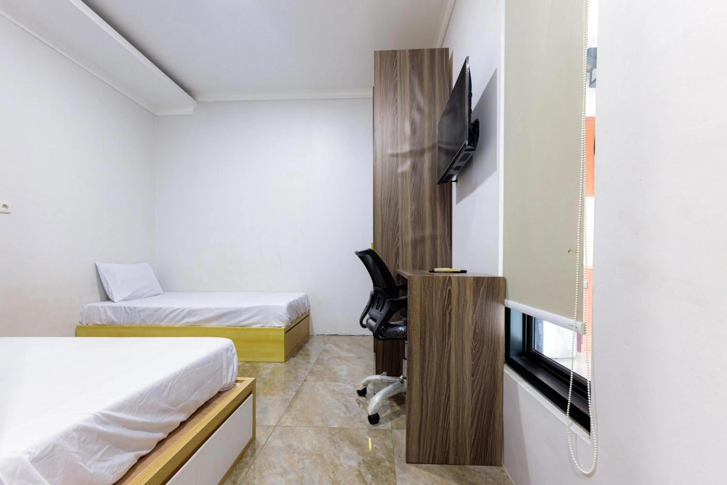 Bed in D Twinz House Syariah Redpartner