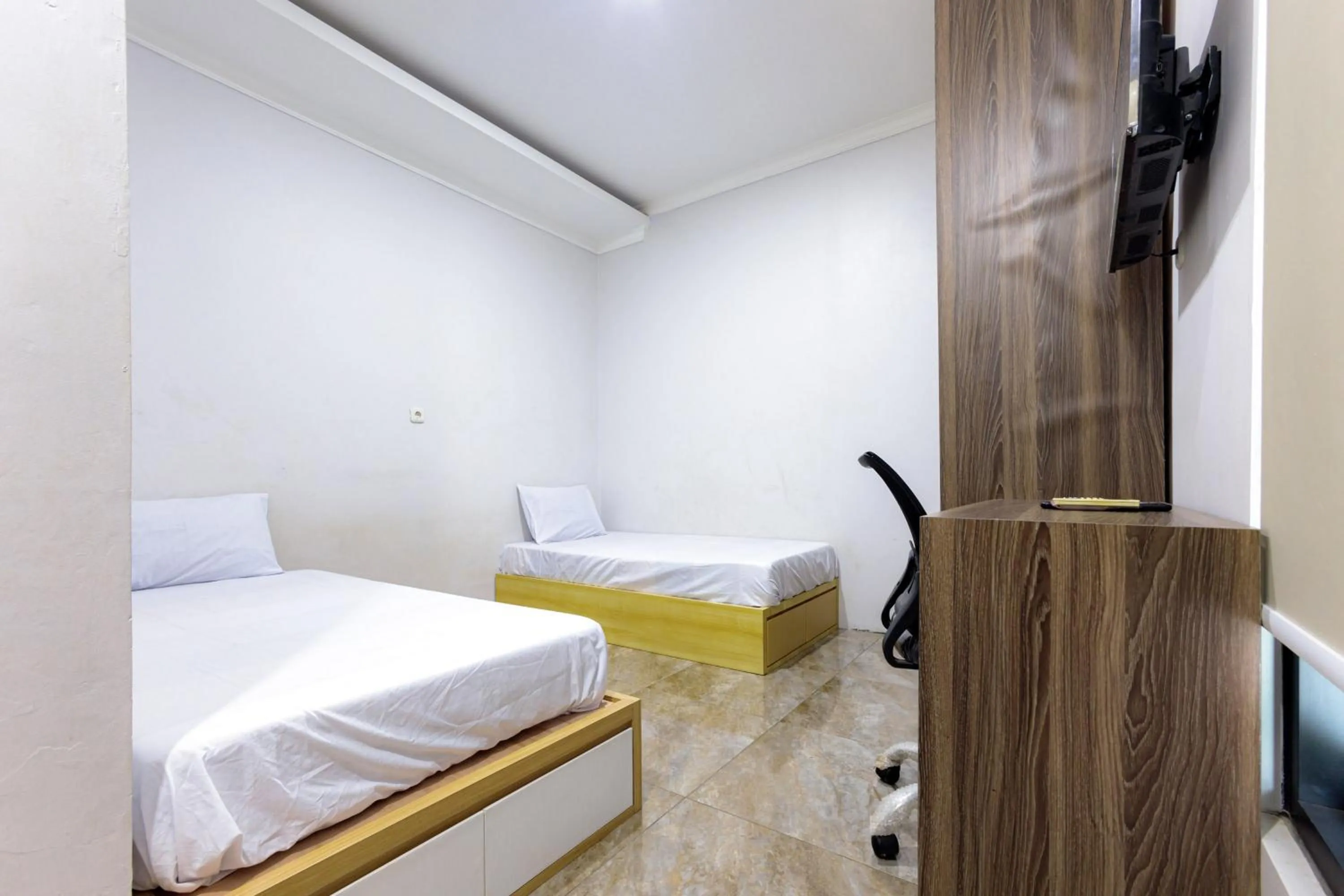 Bed in D Twinz House Syariah Redpartner