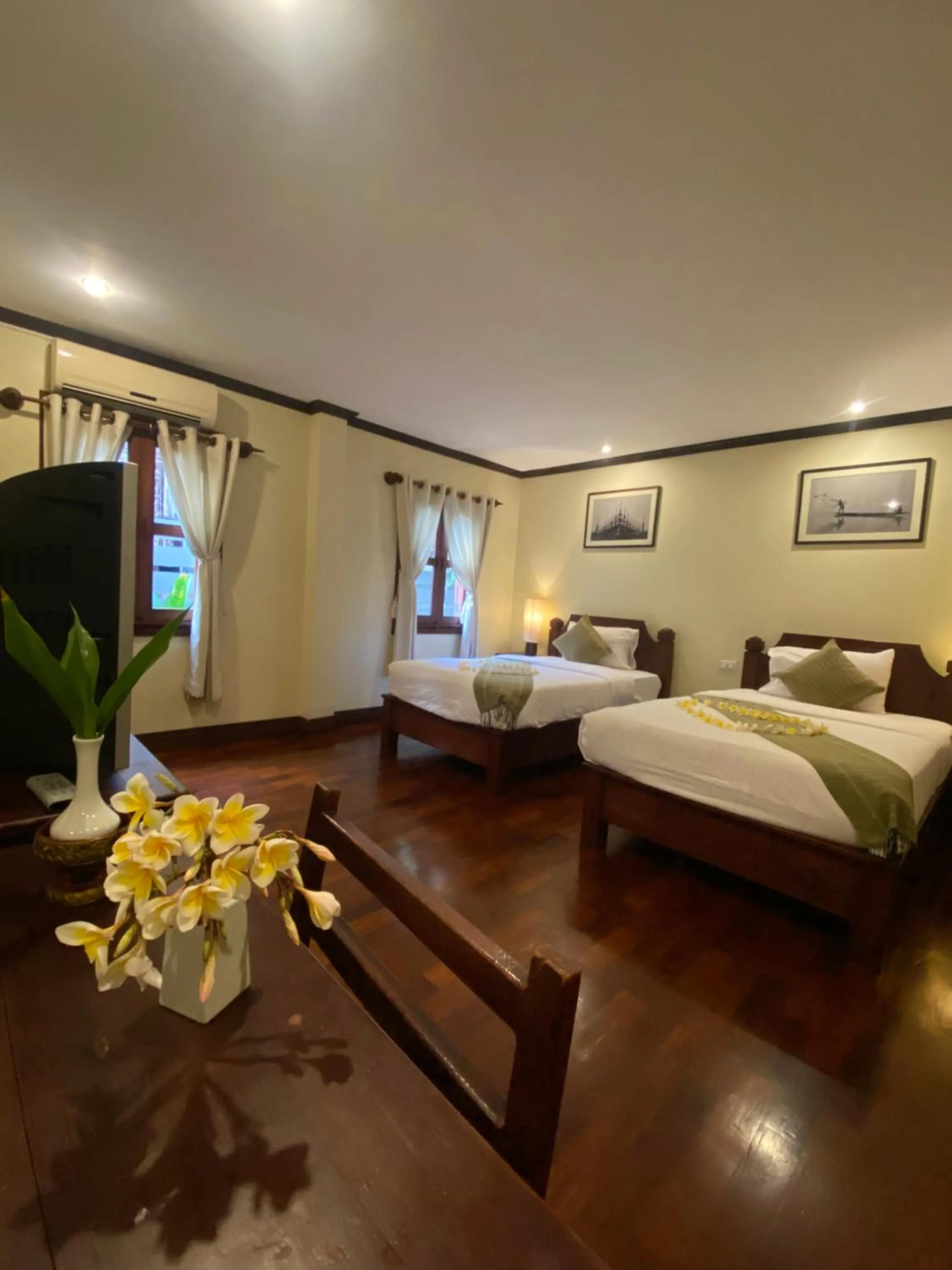 Photo of the whole room, Bed in Luang Prabang Residence & Travel