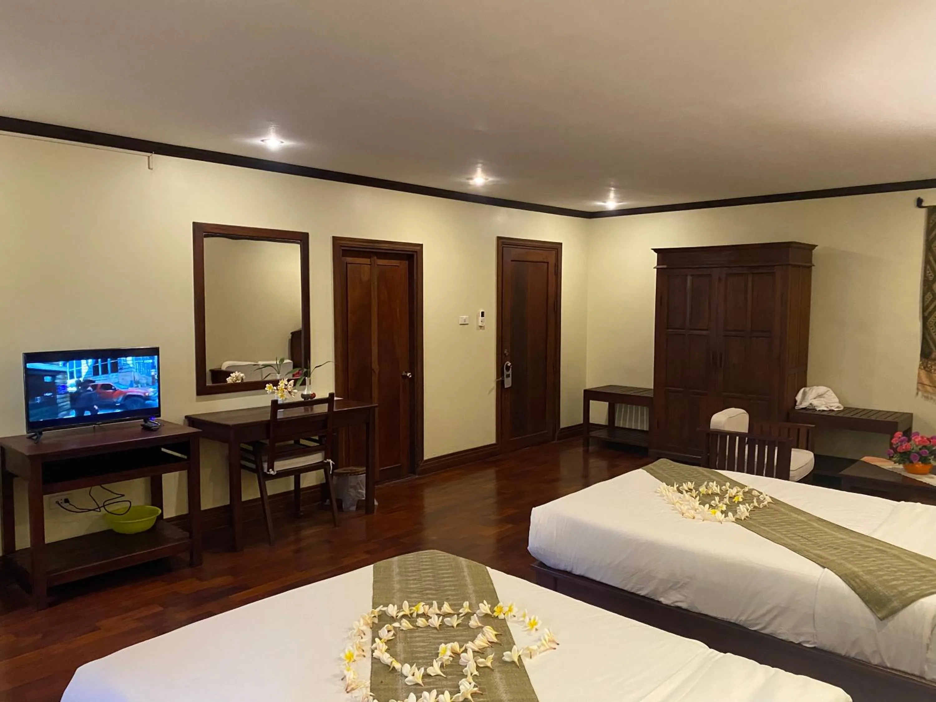 Bed in Luang Prabang Residence & Travel