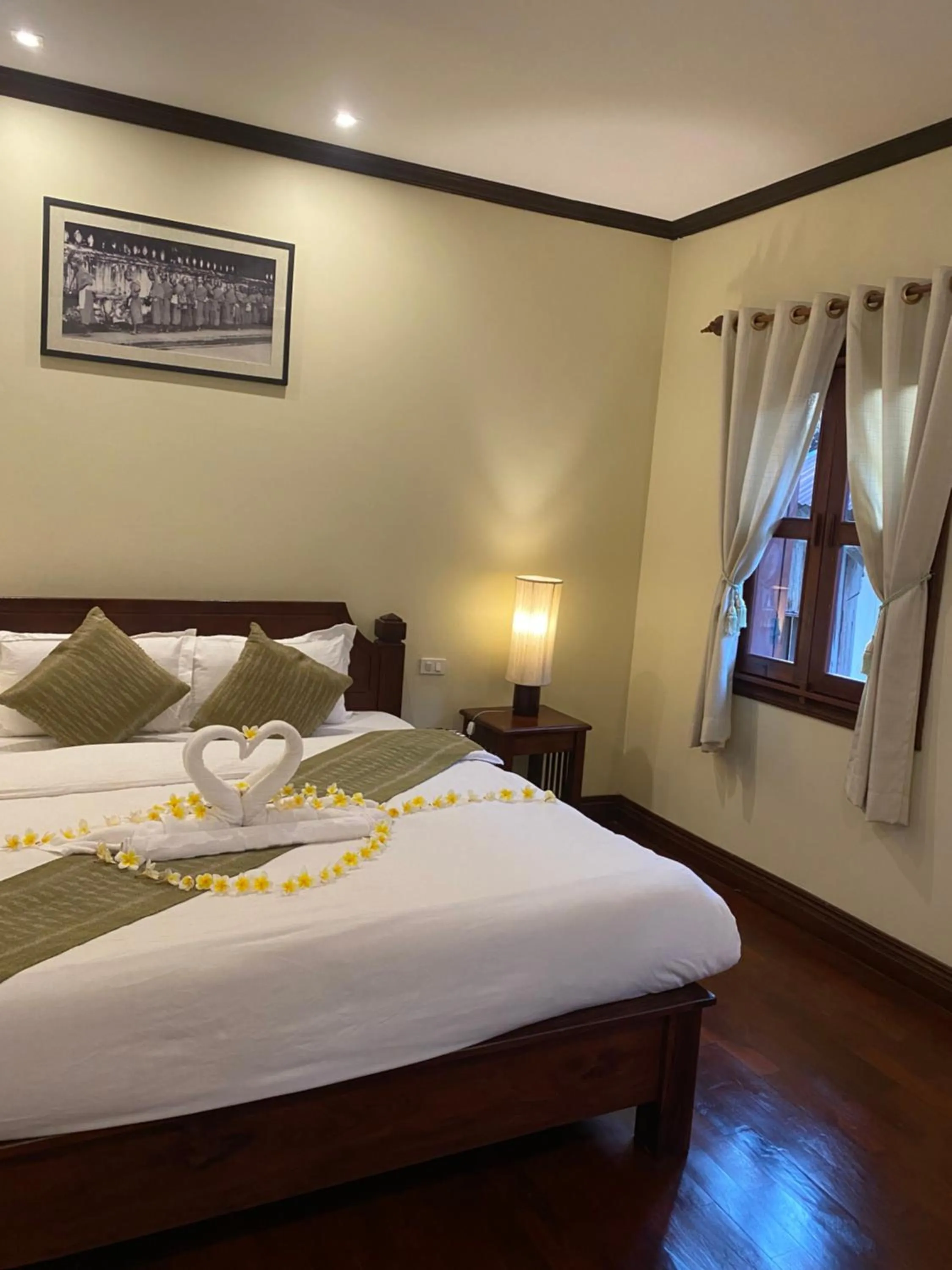 Bed in Luang Prabang Residence & Travel