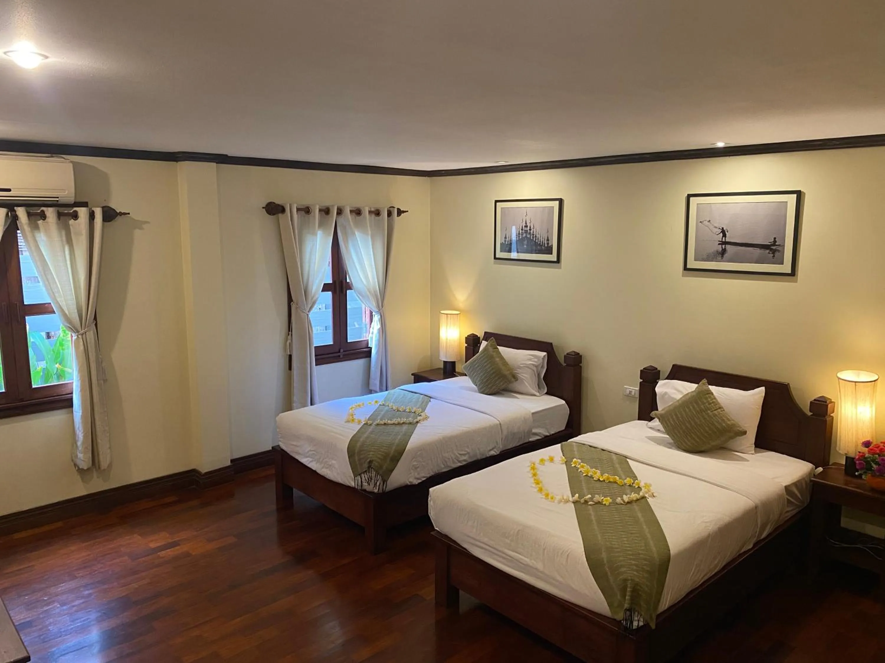 Bed in Luang Prabang Residence & Travel