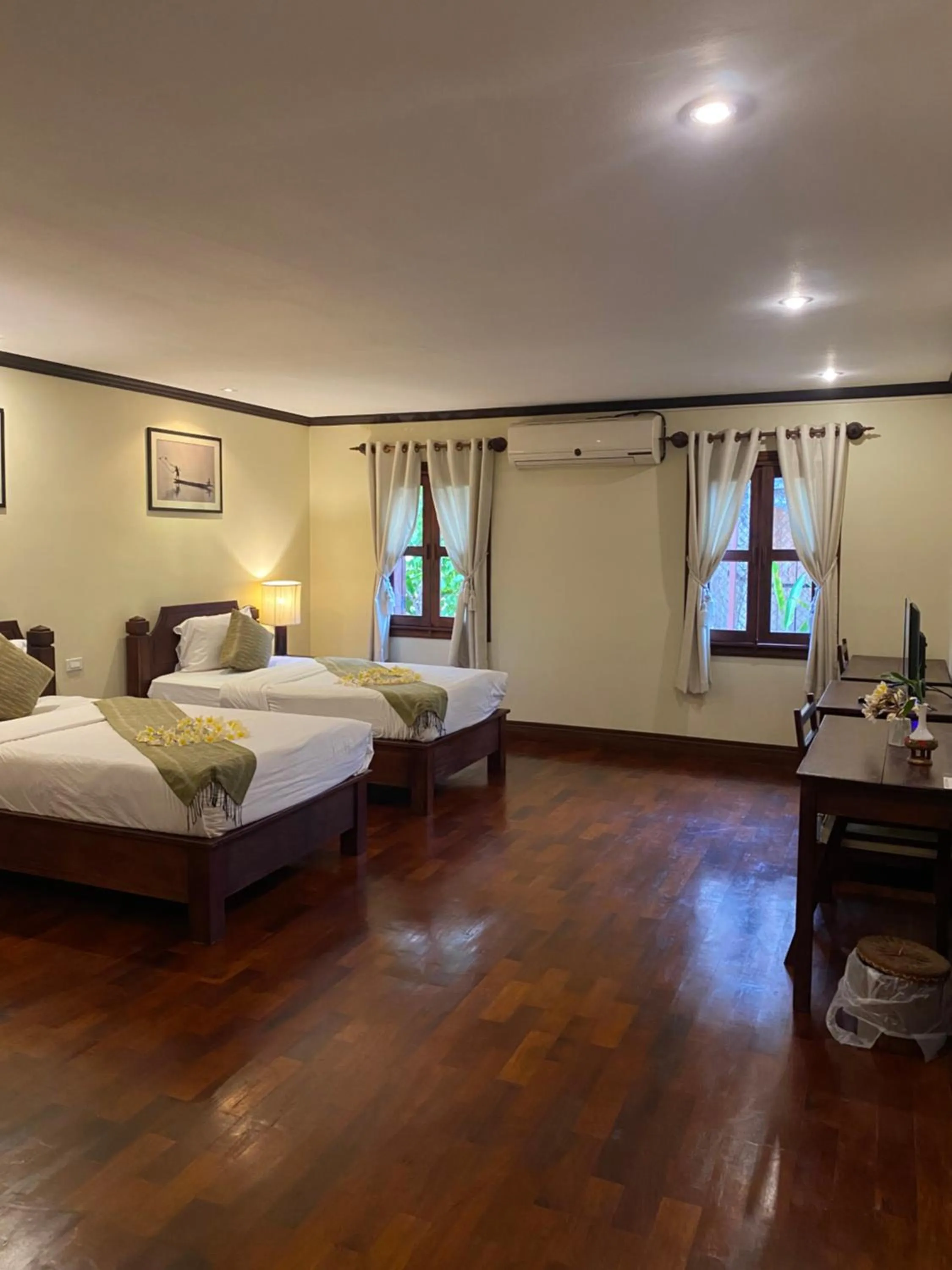 Bed in Luang Prabang Residence & Travel