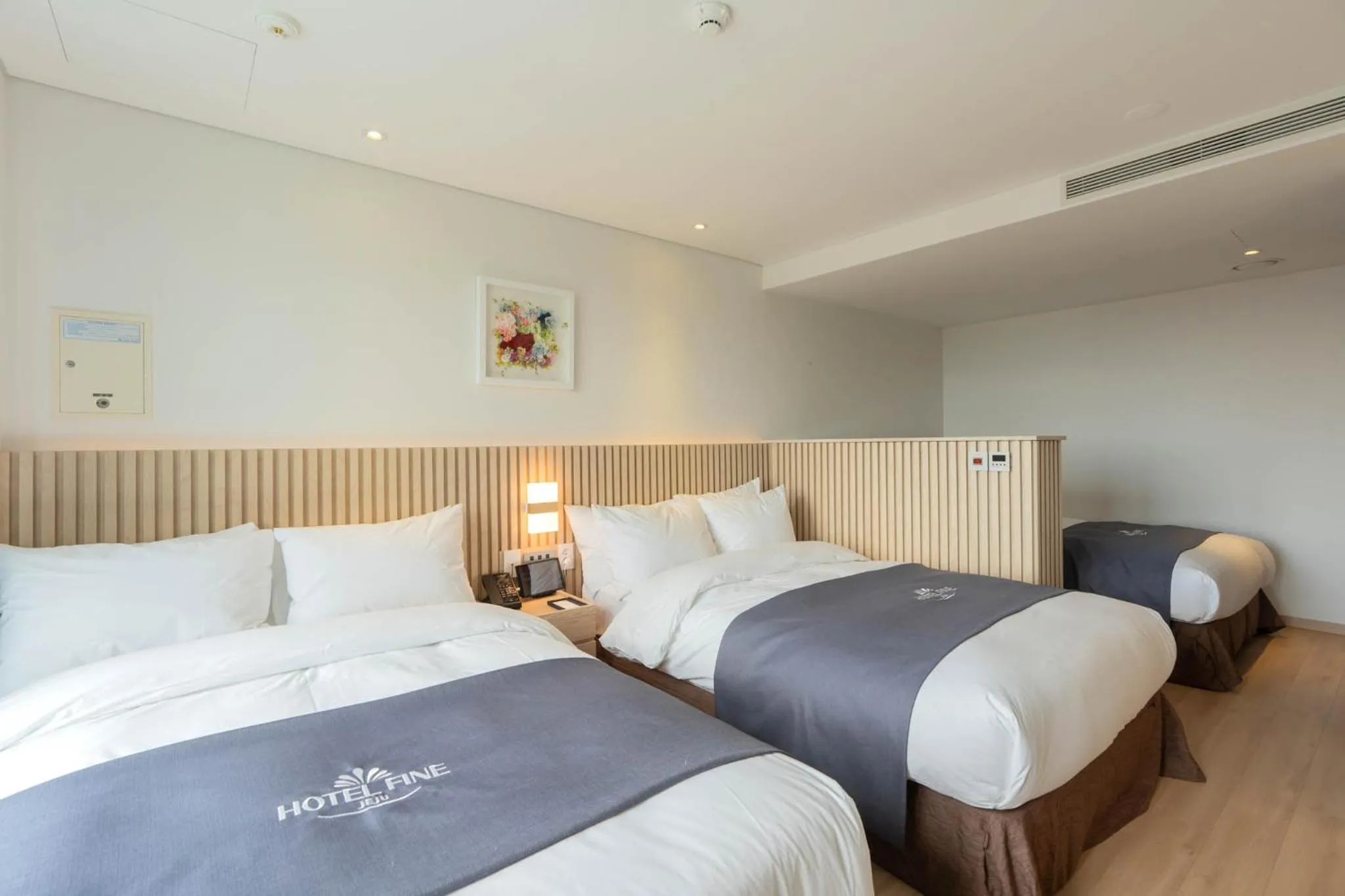 Bed in Hotel Fine Jeju