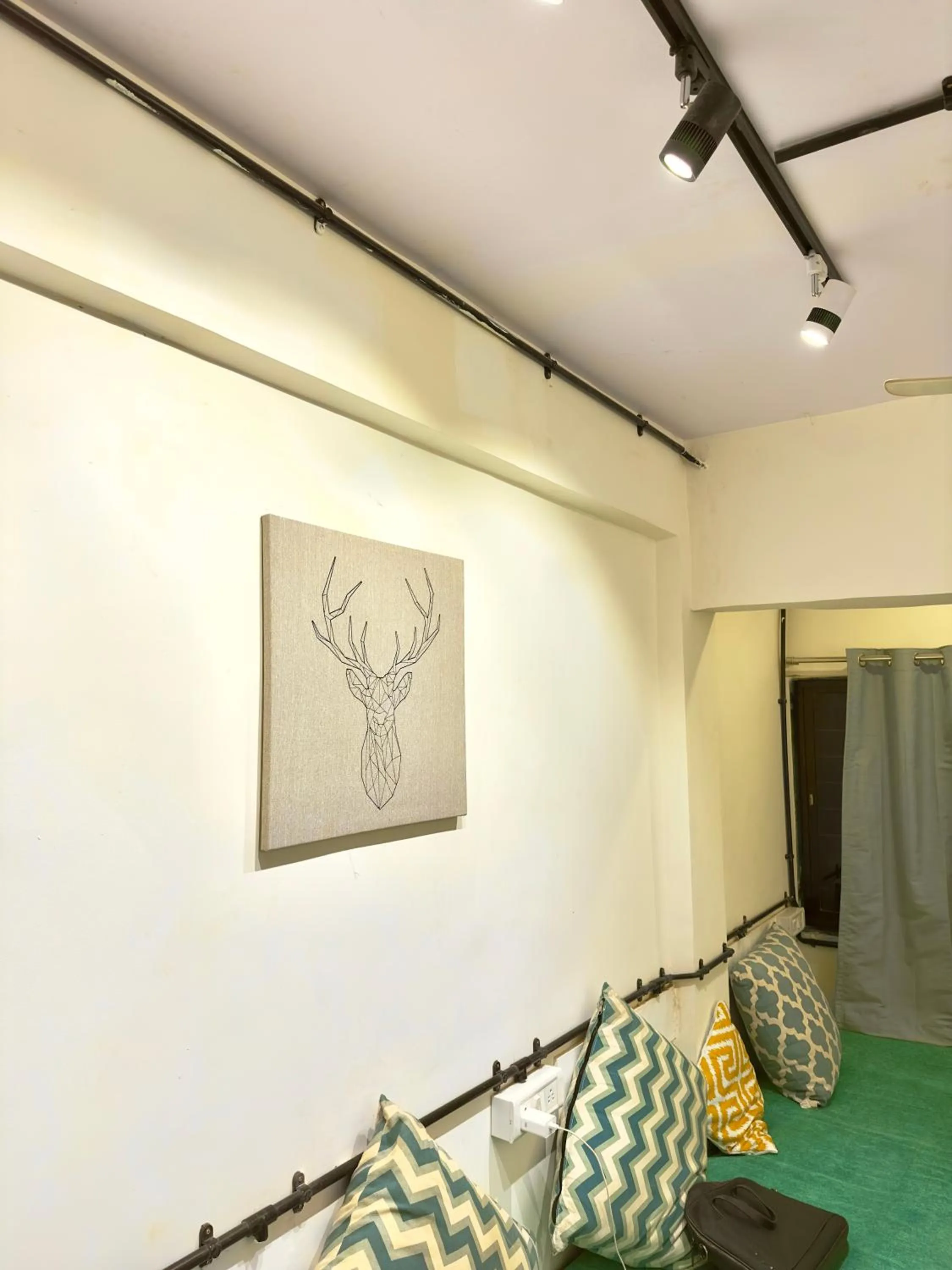 Communal lounge/ TV room in Locomo Hostel Express - Stay Work Eat