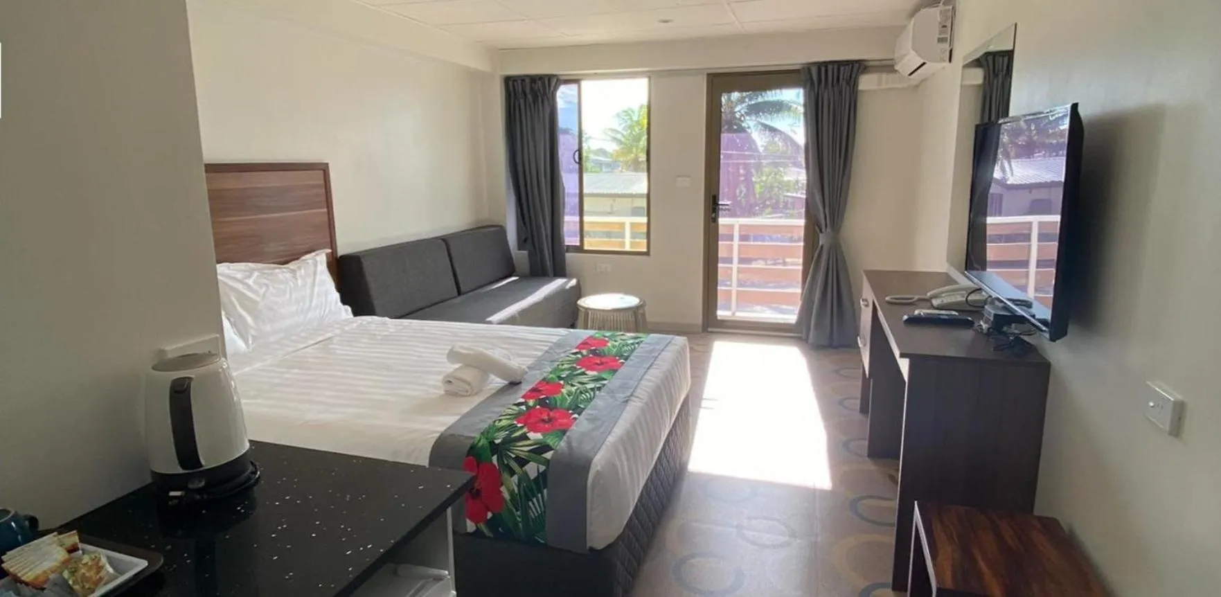 Bed in Vualiku Hotel & Apartments