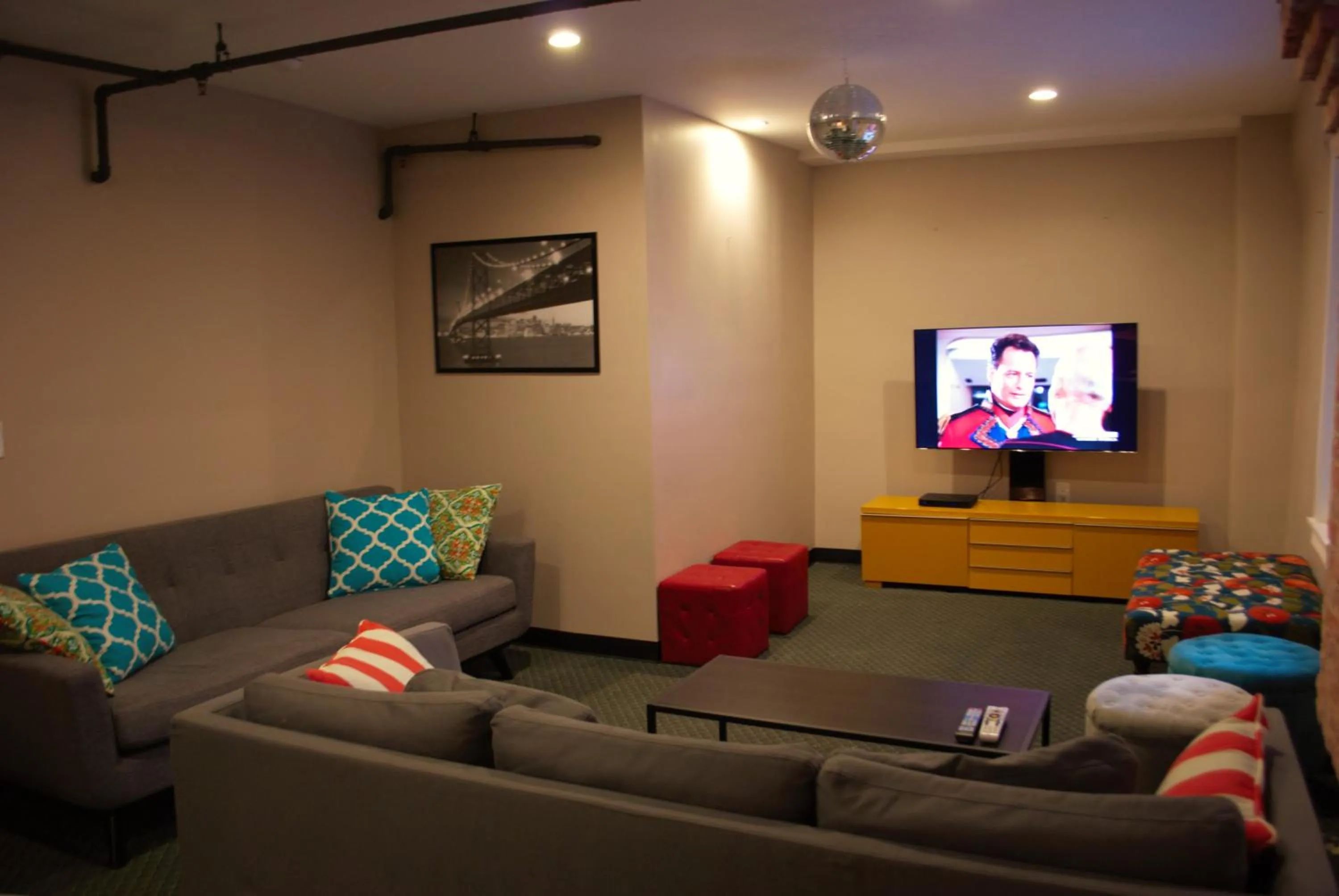 Communal lounge/ TV room in Orange Village Hostel