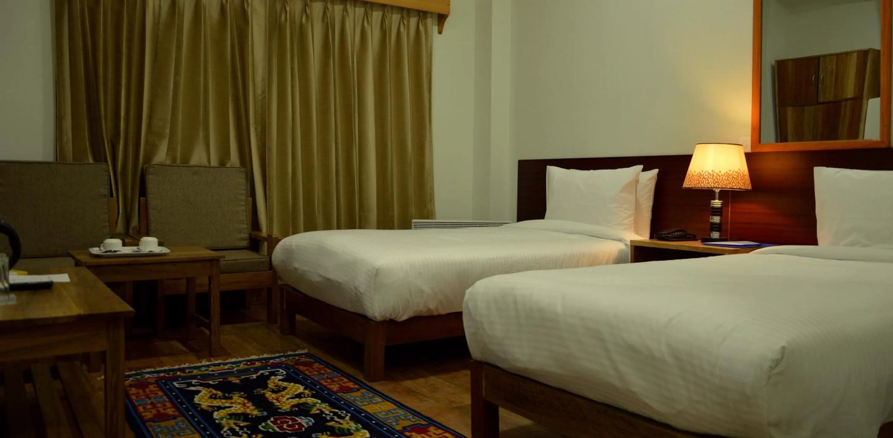 Bed in Hotel Amodhara