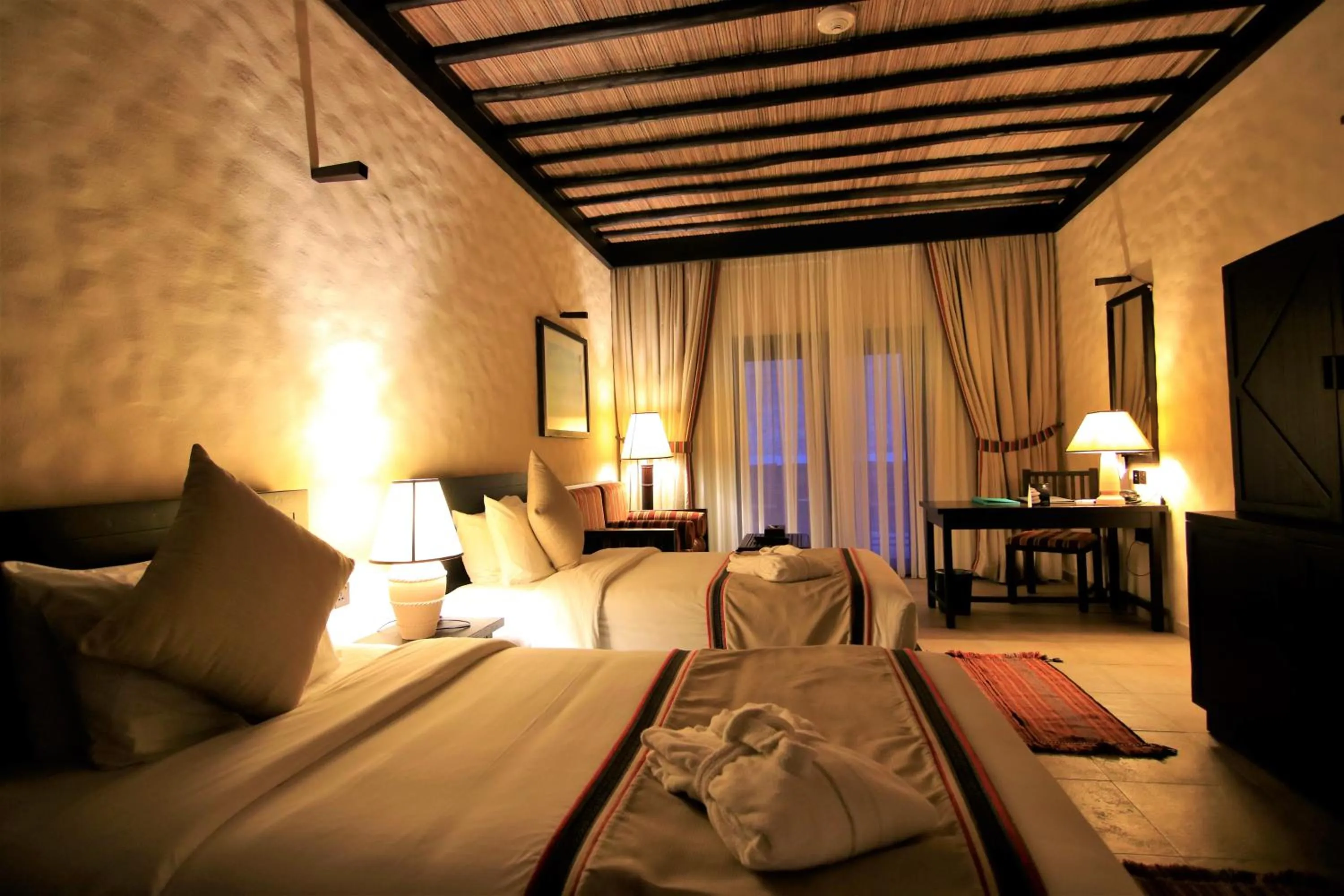 Bed in Atana Musandam Resort