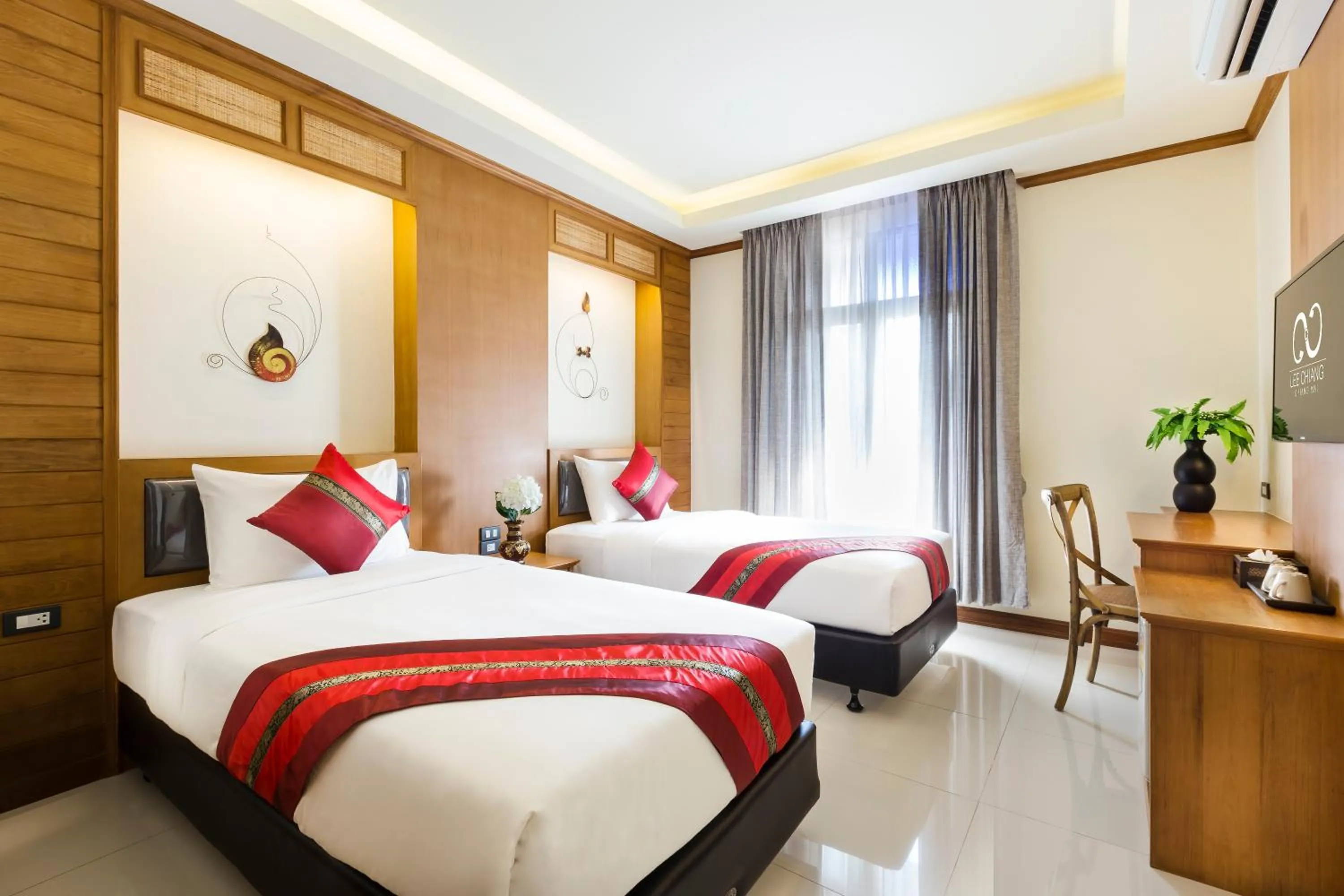 Bed in Lee Chiang Hotel