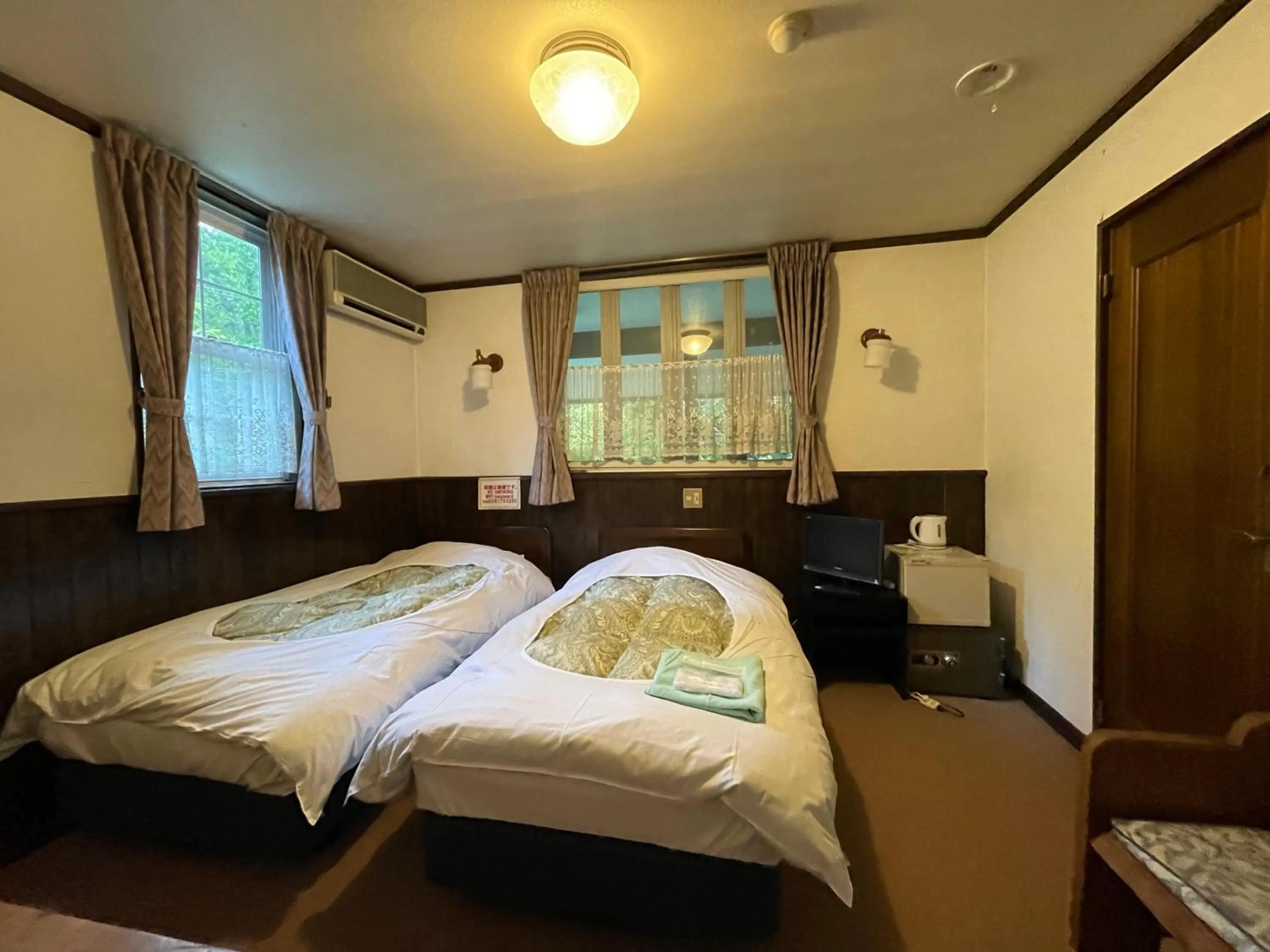 Bed in Hotel Sejour Mint in Hakuba