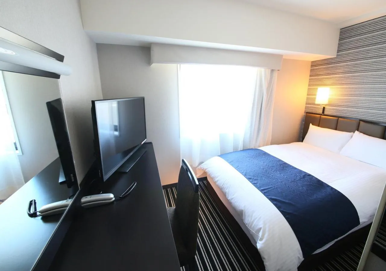 Photo of the whole room, Bed in APA Hotel Shinjuku Gyoemmae