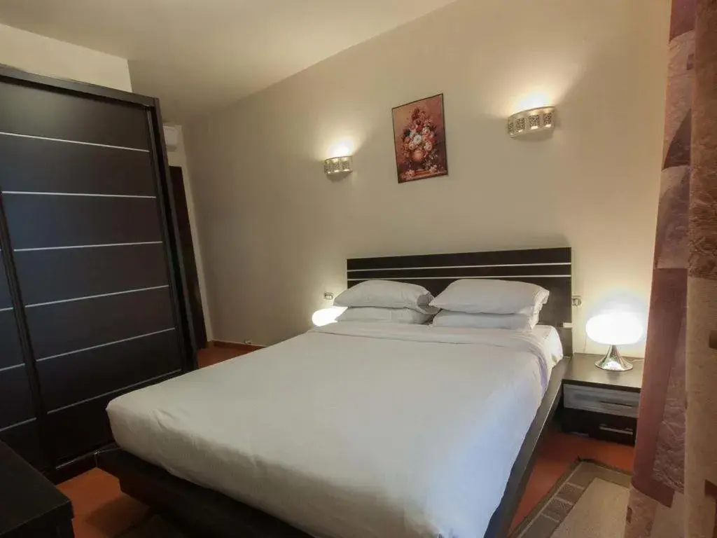 Bed in Porto Golf Marina Apartments By Amer-Group Bed in Porto Golf Marina Apartments By Amer-Group