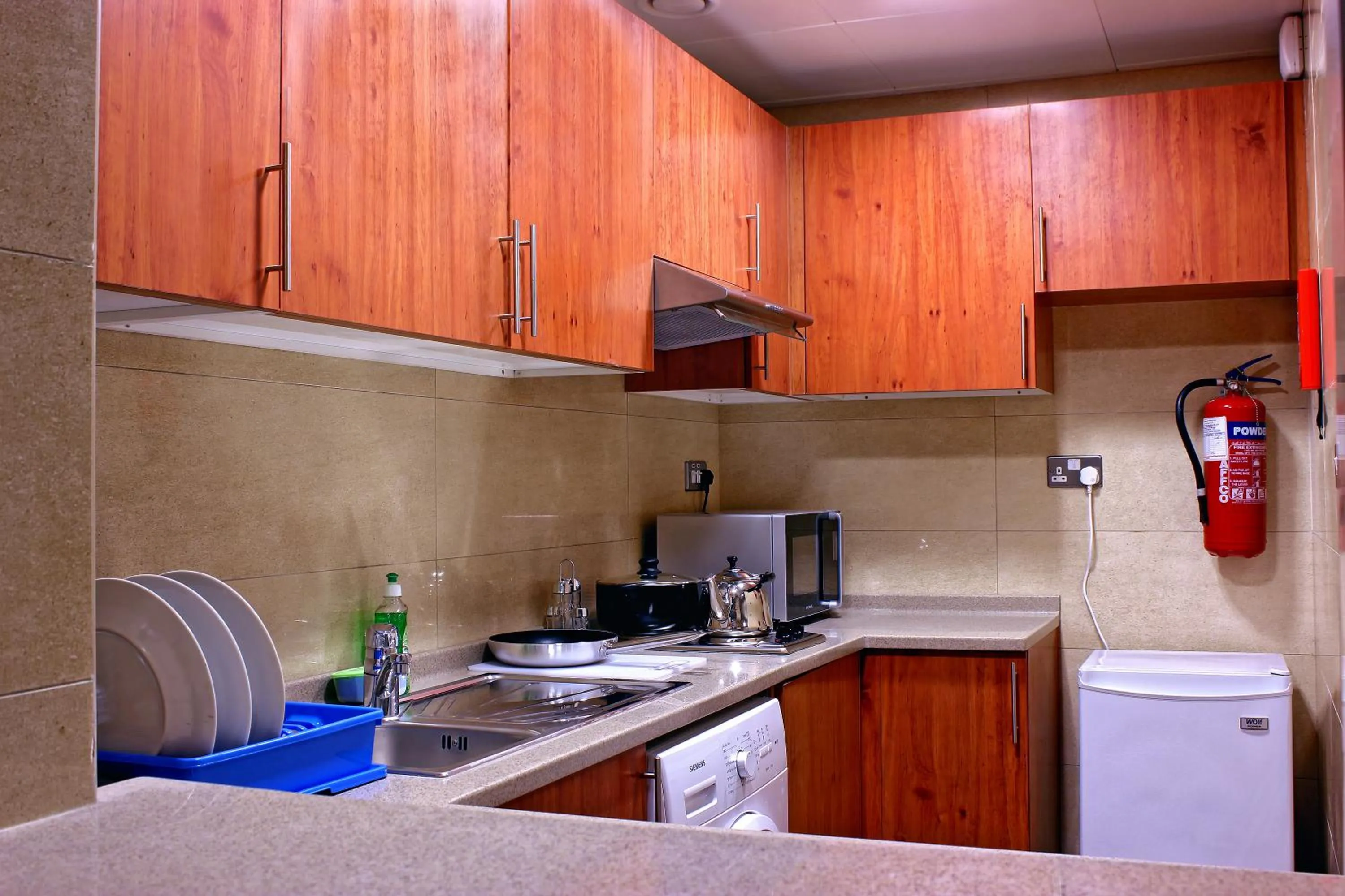 Kitchen or kitchenette in Paragon Hotel Apartments