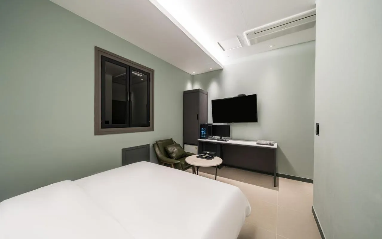 Bed in HOTEL MYEONG JAK