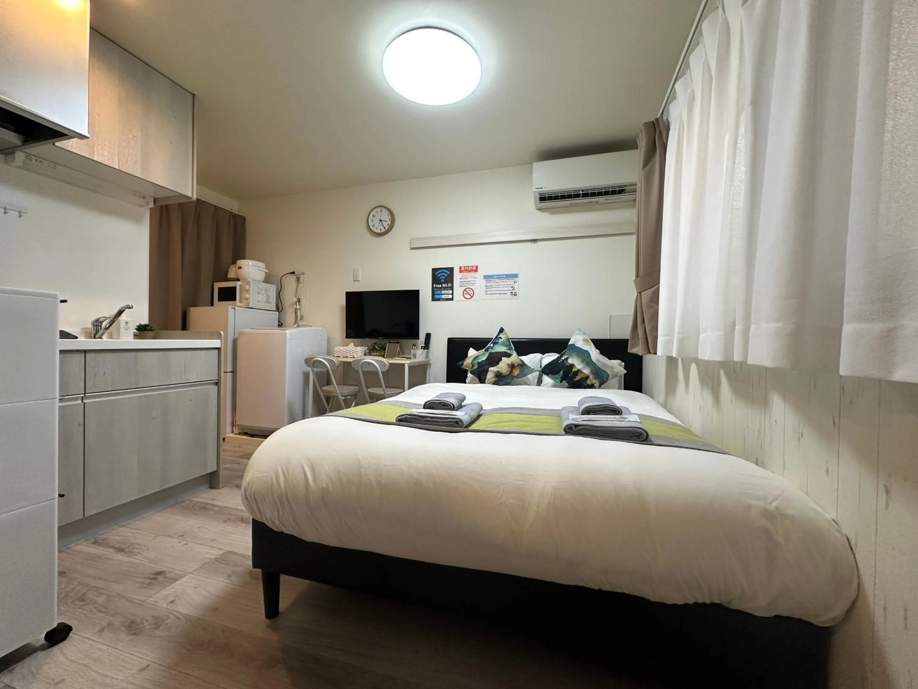 Bed in nestay apartment tokyo waseda