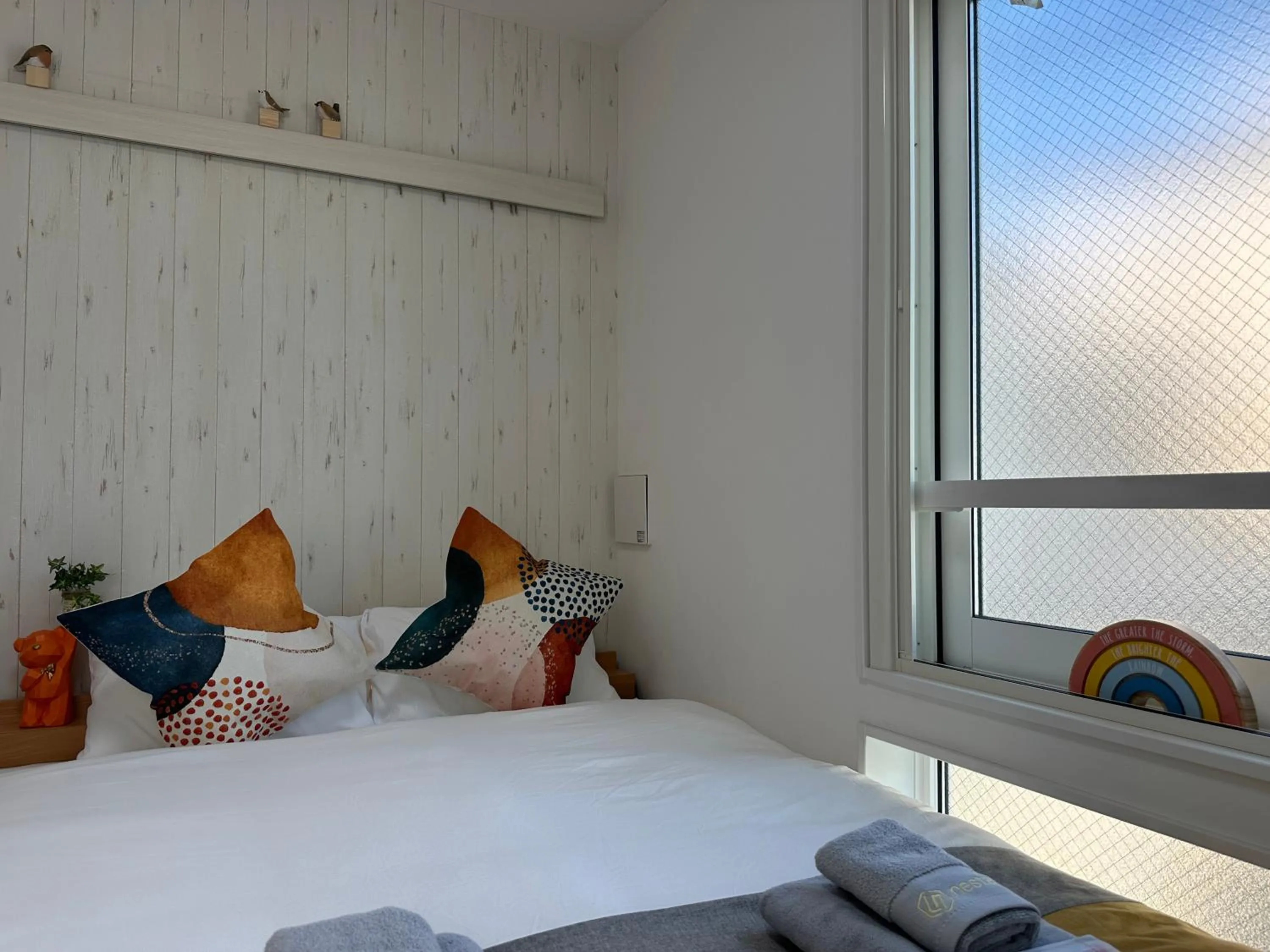 Bed in nestay apartment tokyo waseda