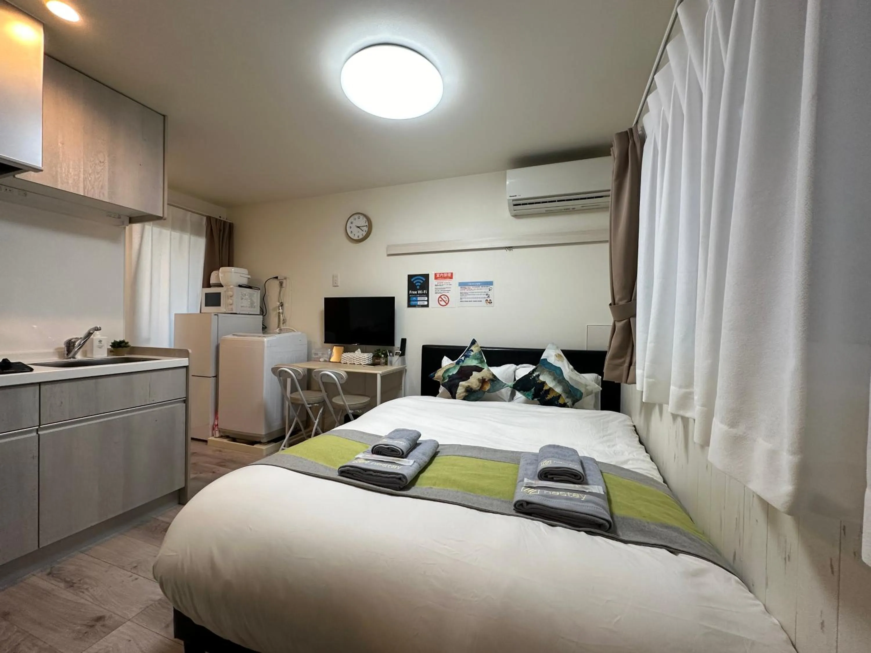 Bed in nestay apartment tokyo waseda