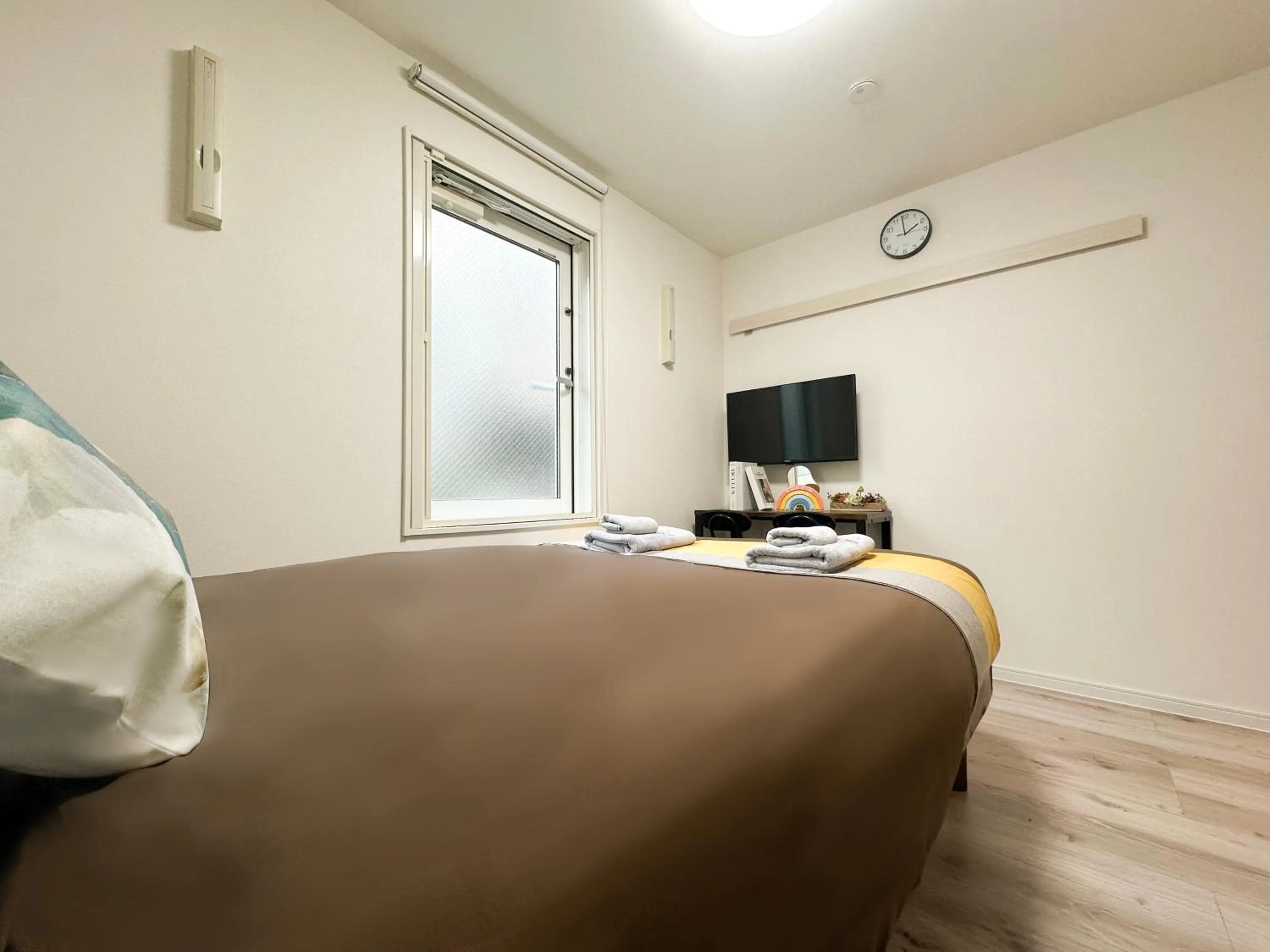 Bed in nestay apartment tokyo waseda