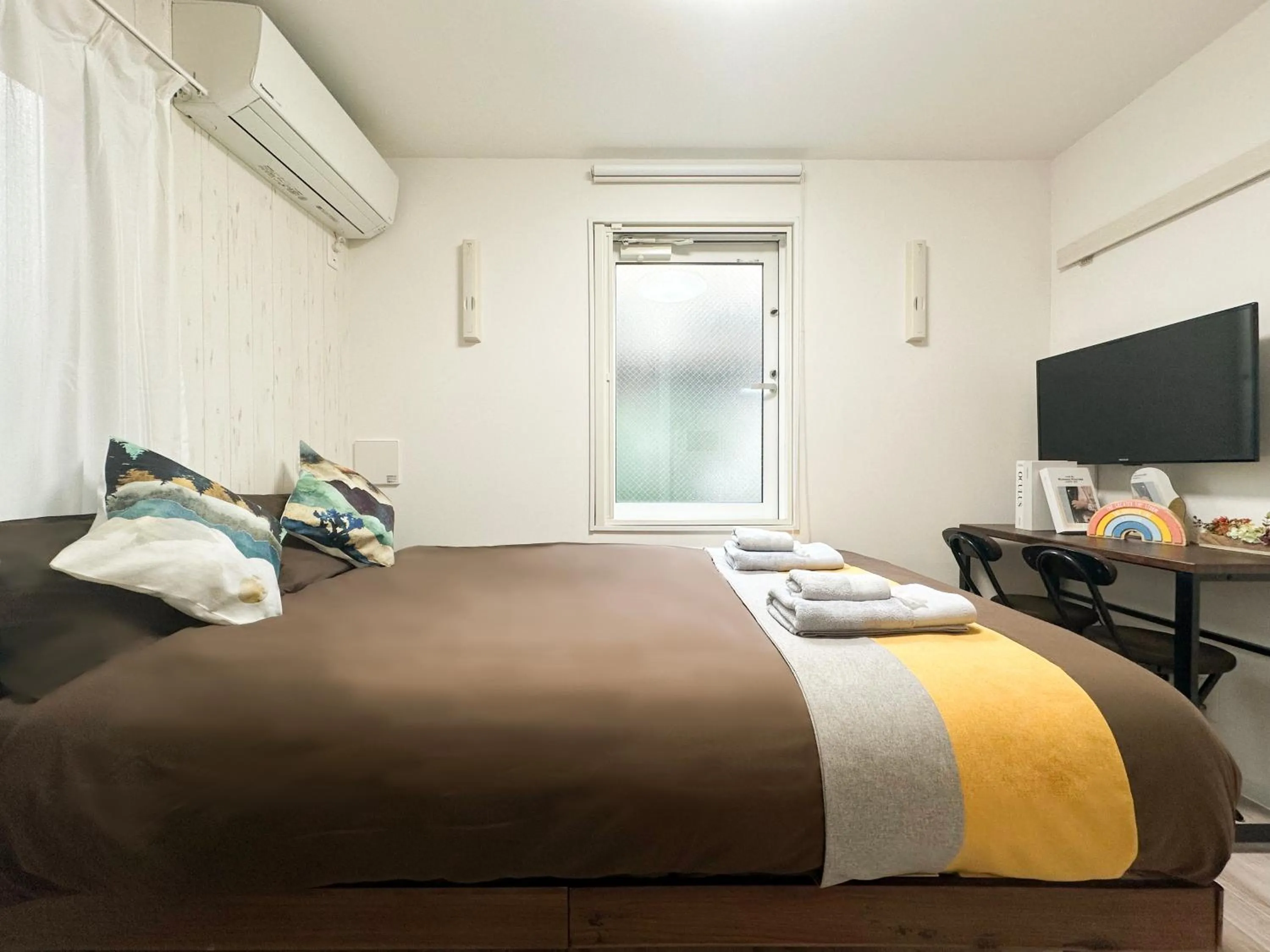 Bed in nestay apartment tokyo waseda